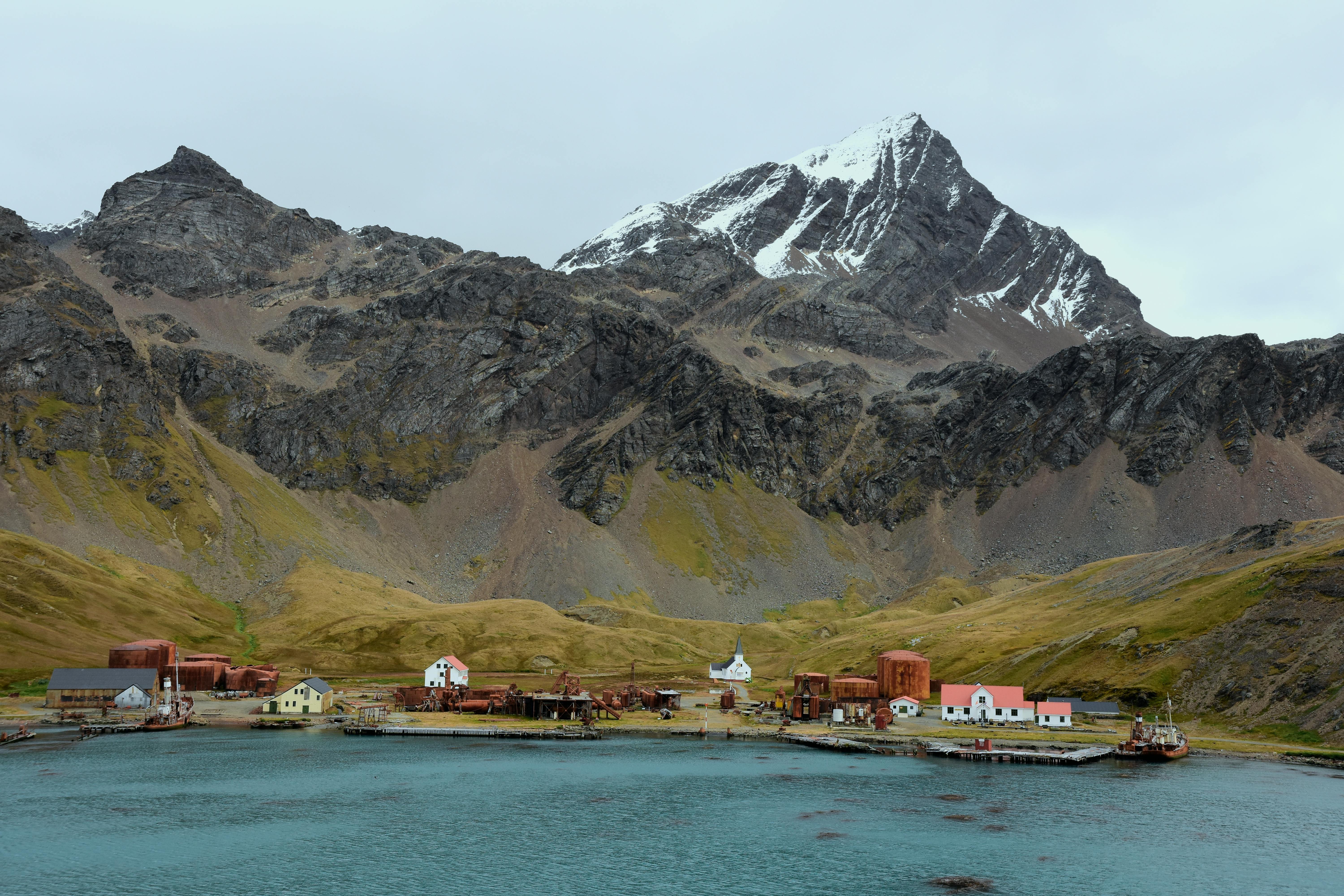 Scenic view of Grytviken harbor with mountains in South Georgia.