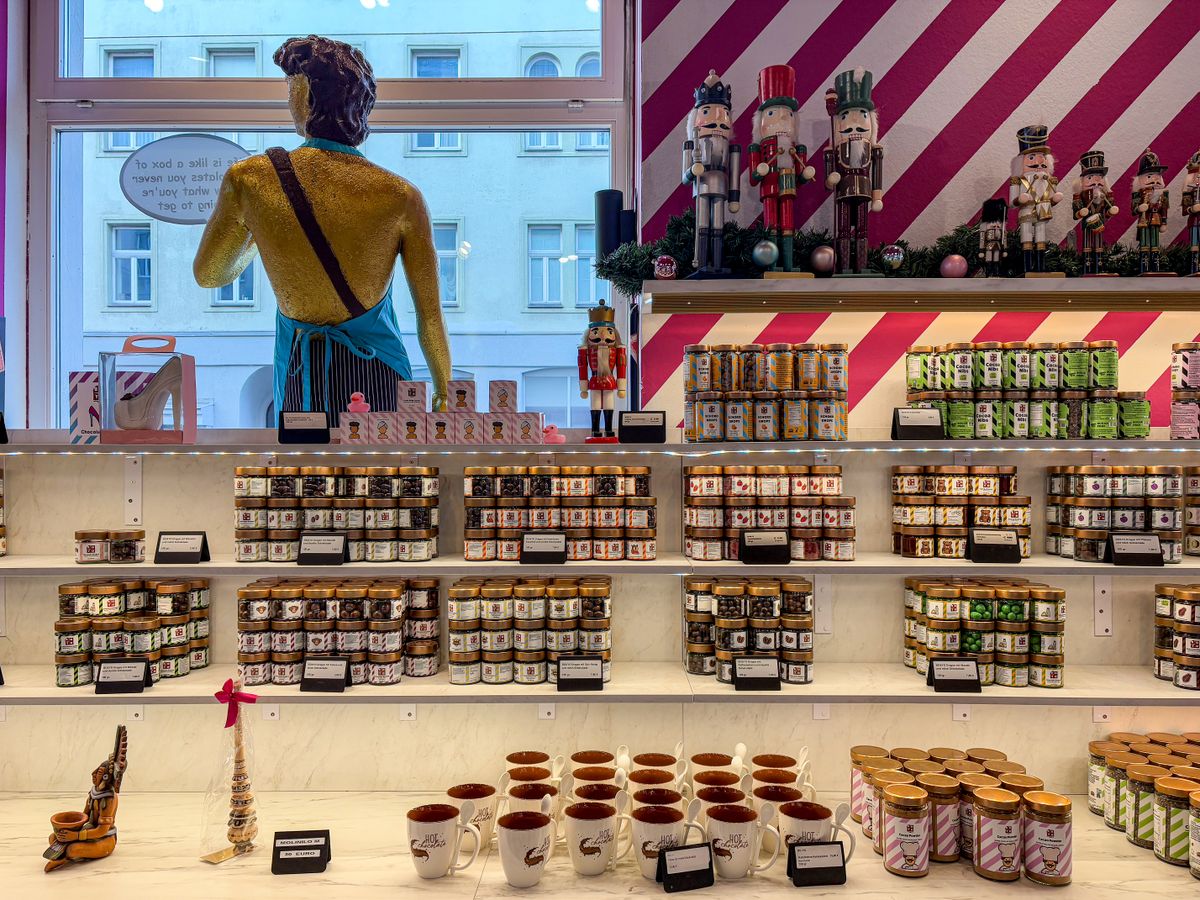 A vibrant candy shop adorned with nutcrackers and sweets, creating a festive atmosphere.
