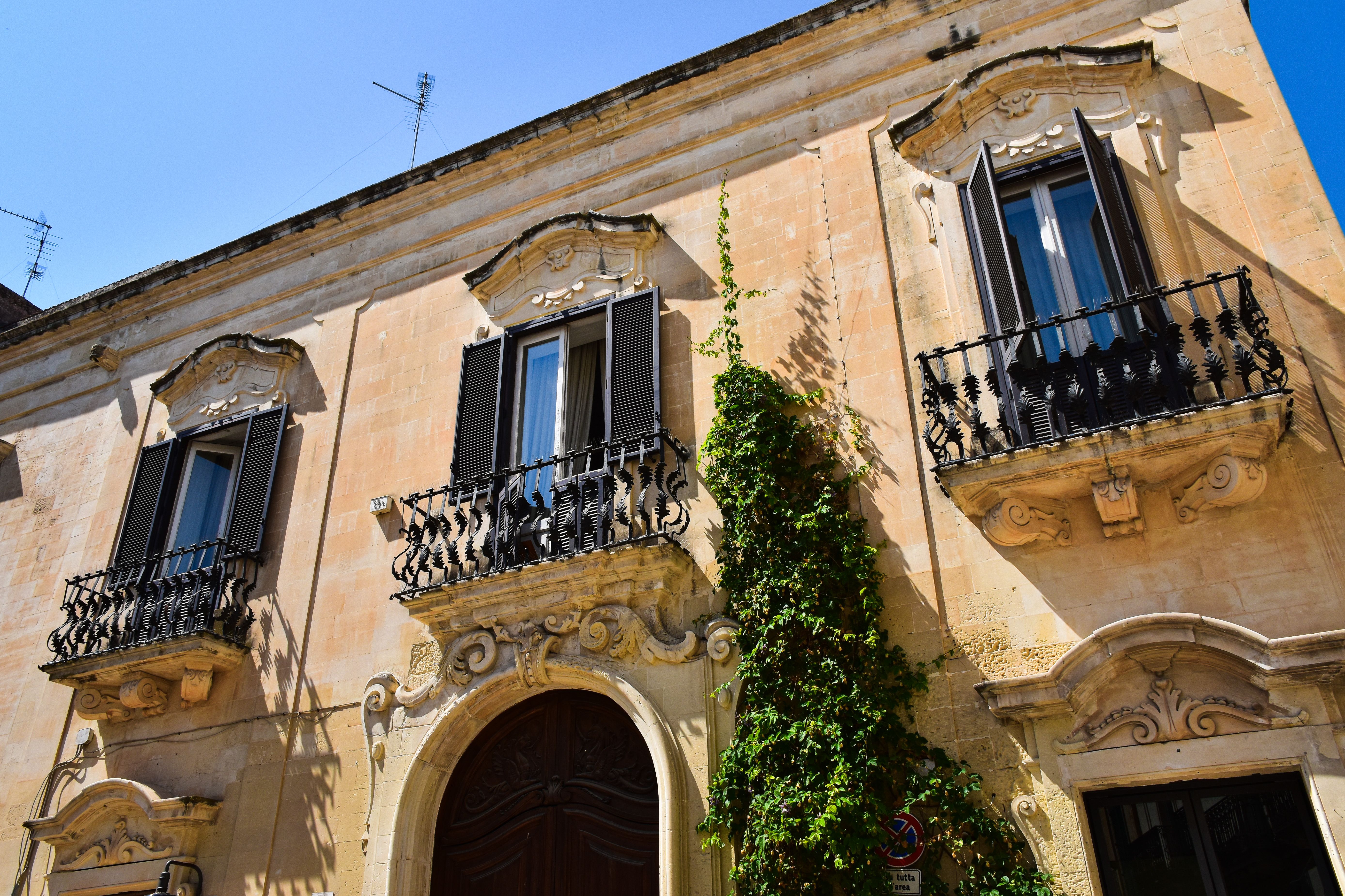 Stunning Baroque facade in Apulia, Italy showcasing ornate details and classic architecture.