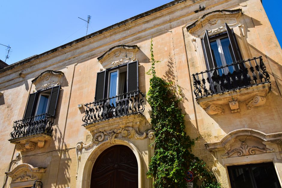 Stunning Baroque facade in Apulia, Italy showcasing ornate details and classic architecture.