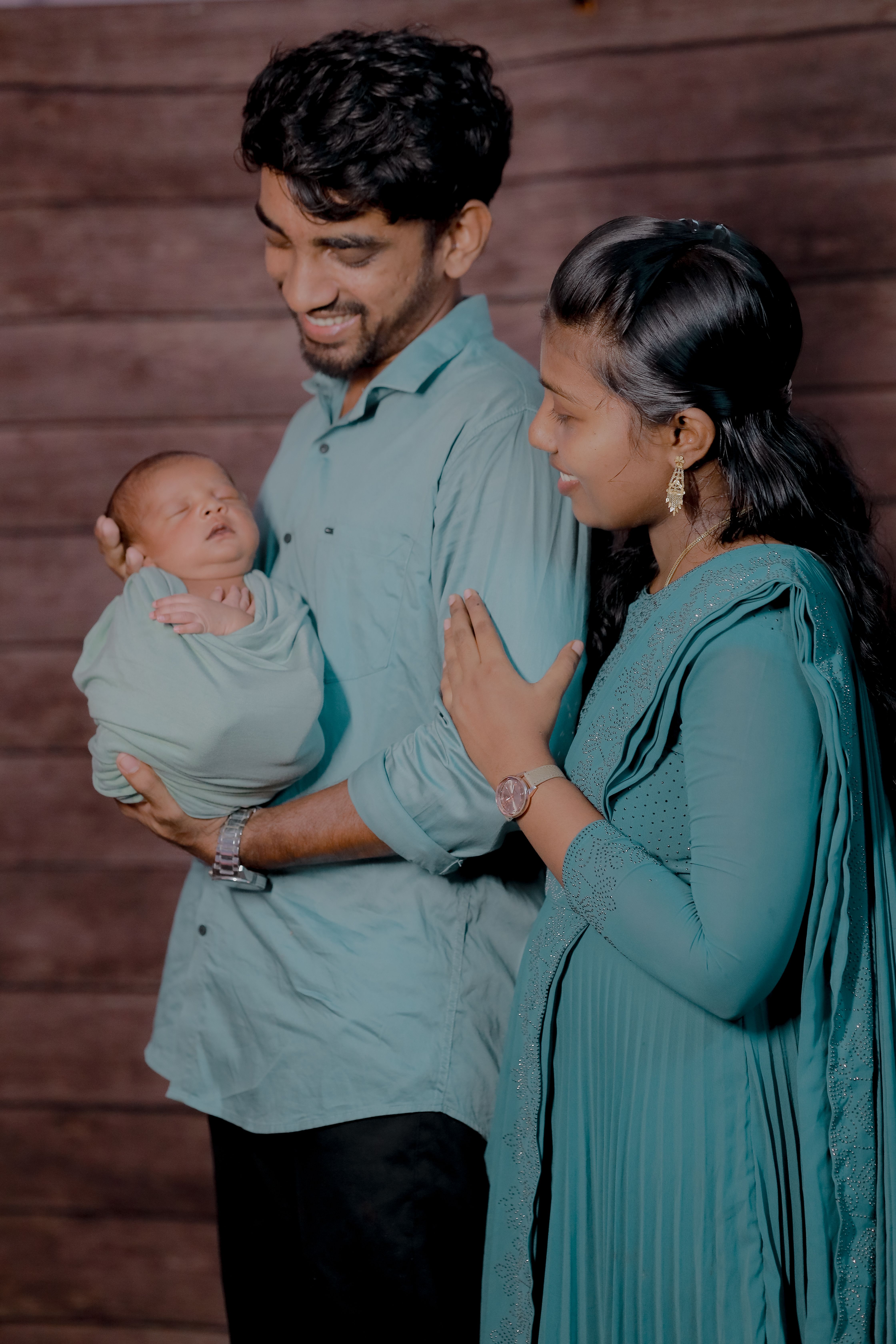 Joyful Indian Family with Newborn Baby Portrait · Free Stock Photo