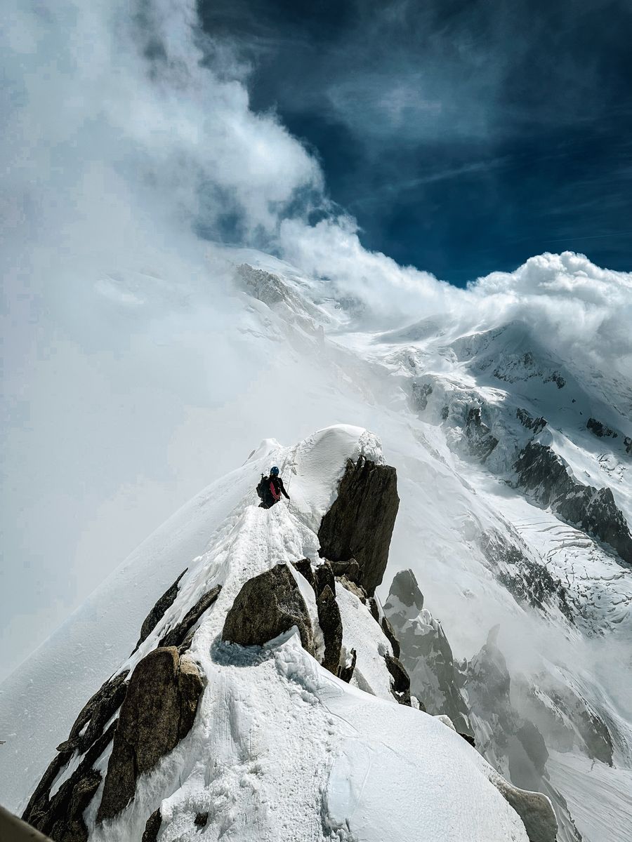 Two climbers ascending a snowy ridge — photo by Steven Duque on Pexels