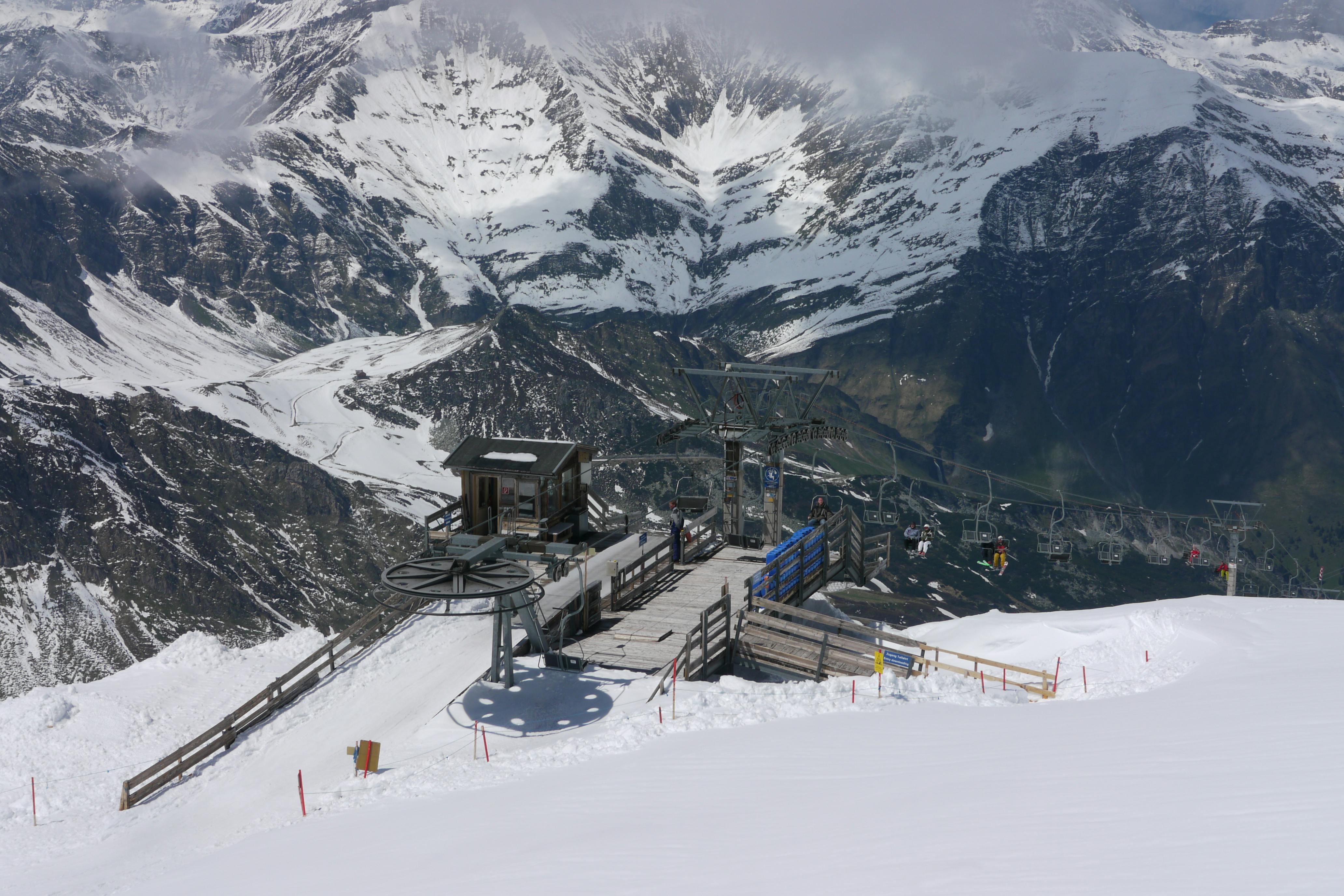 A stunning view of snowy mountains and ski lift, perfect for winter sports enthusiasts.