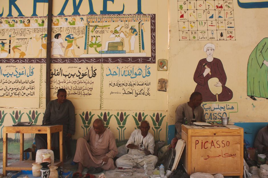 Ancient Egyptian craftsmen working with stone and wood - mentorship in the trades Ancient Egyptian craftsmen working with stone and wood - mentorship in the trades