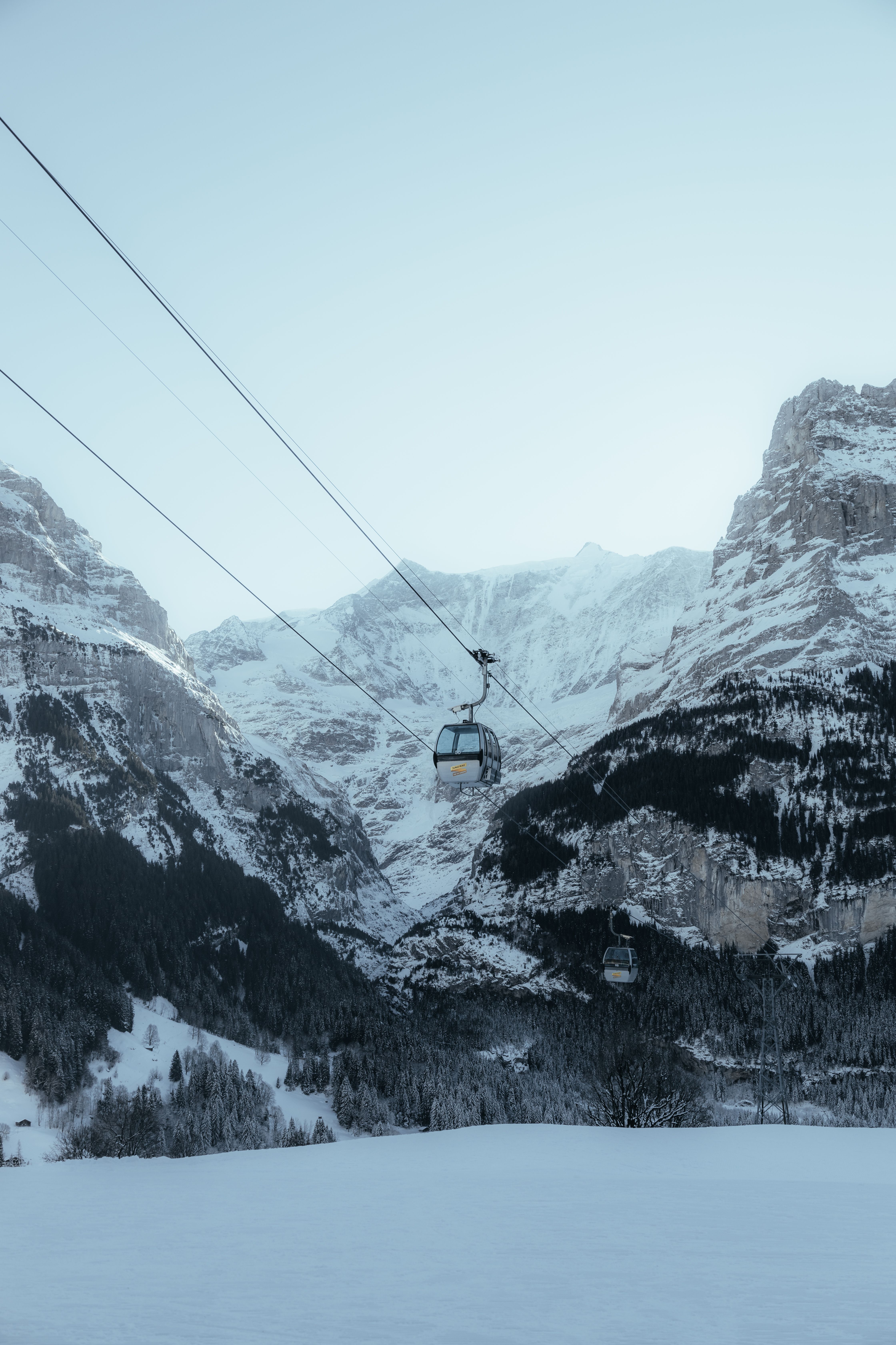 Ski Lift Over Snowy Alpine Mountains in Winter · Free Stock Photo