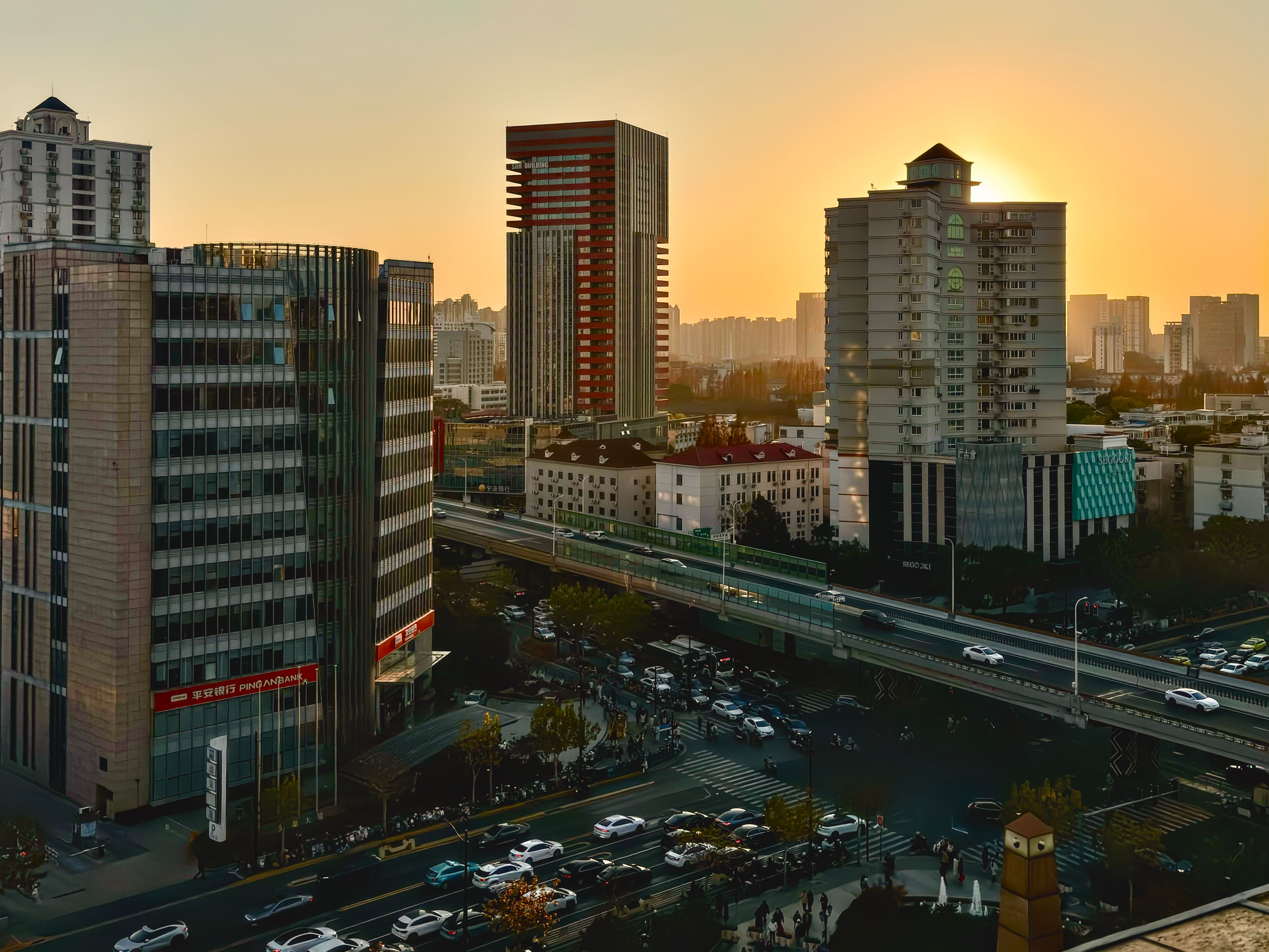Sunset Over Urban Skyline in Shanghai · Free Stock Photo