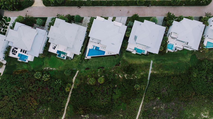 Aerial view of Florida homes with backyard pools