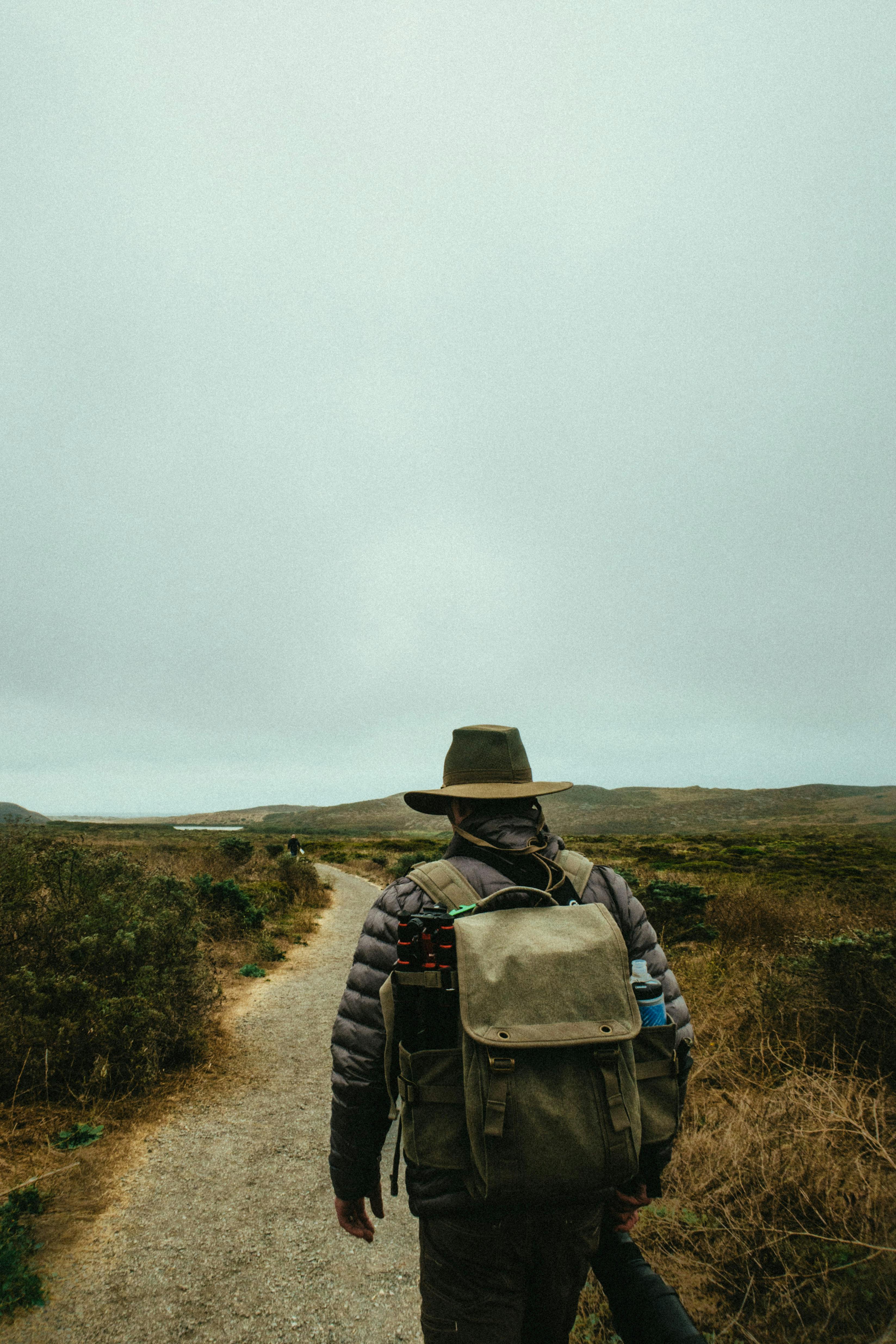 Person Carrying Gray Knapsack Backpack · Free Stock Photo