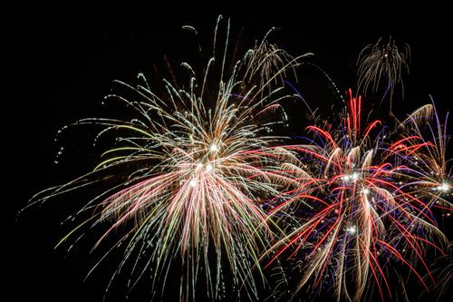Free A stunning display of colorful fireworks illuminating the night sky in Jönköping, Sweden. Stock Photo