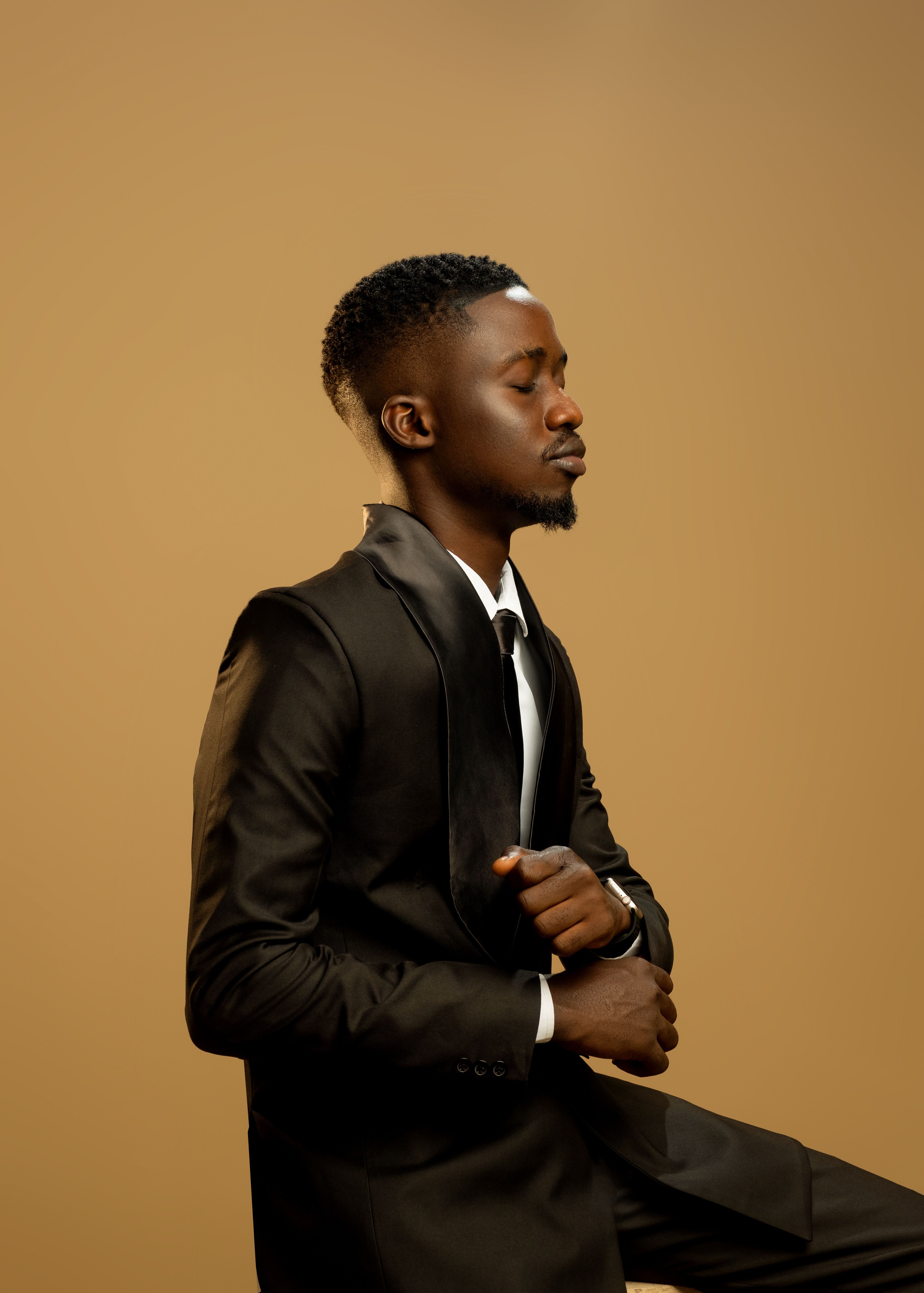 Elegant African Man in Black Suit Portrait · Free Stock Photo