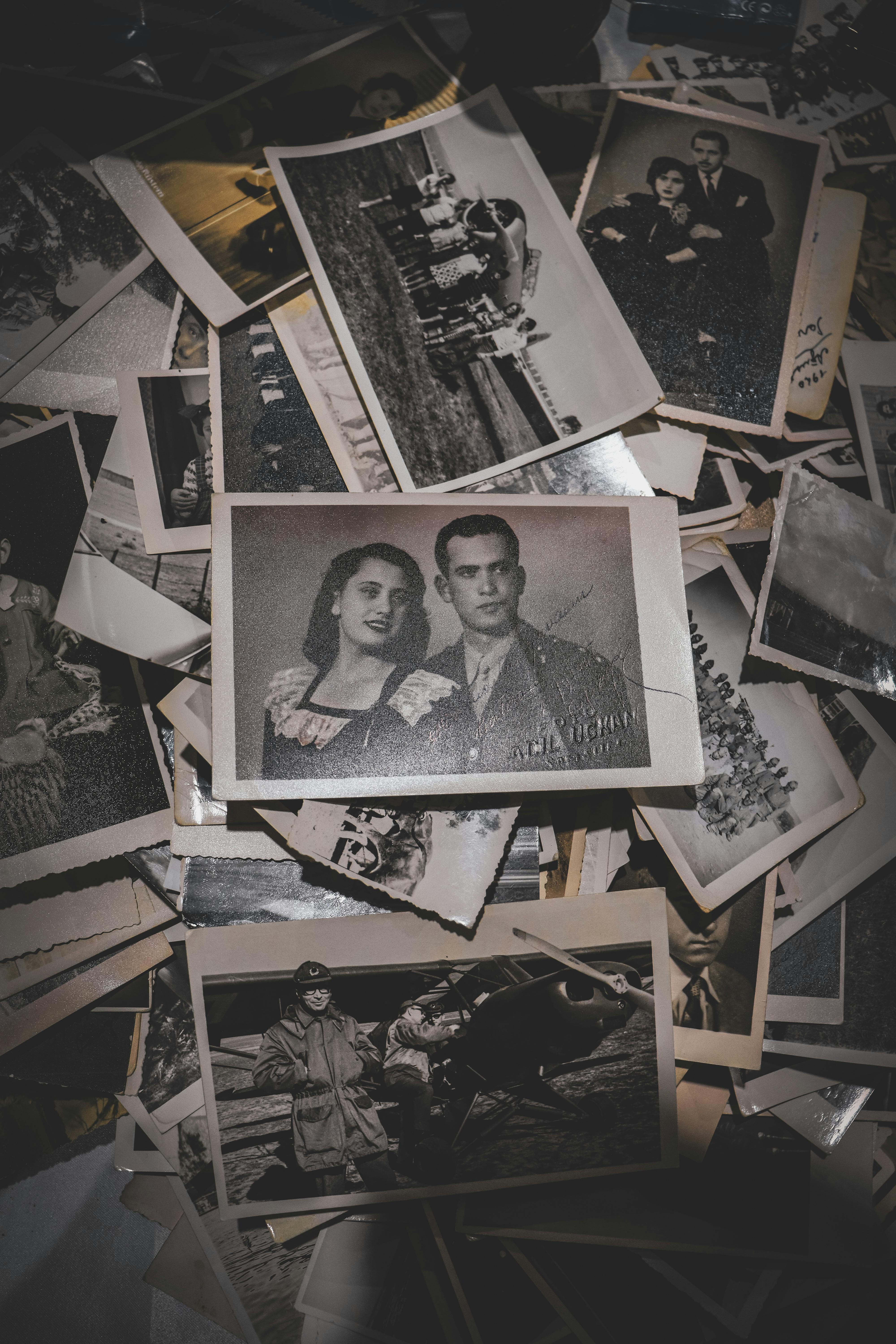 A nostalgic collection of vintage black and white family photographs.