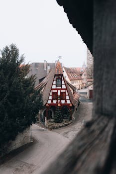 Explore the picturesque architecture of Rothenburg ob der Tauber, showcasing a quaint half-timbered house.