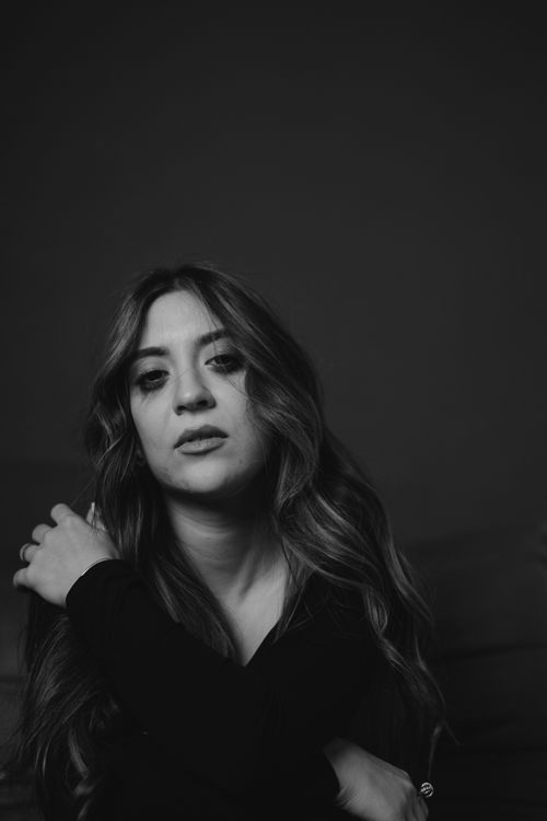 Free Black and white portrait of a woman exuding natural beauty and serenity. Stock Photo