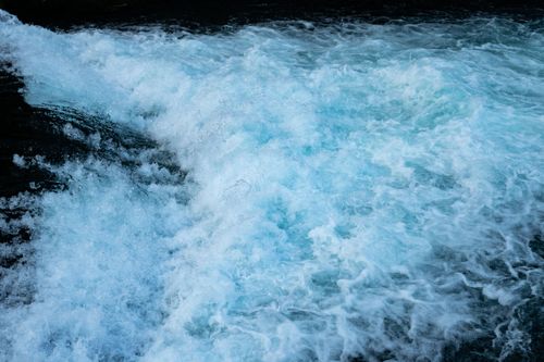 Free A vibrant capture of cascading water in Fontaine-de-Vaucluse, Provence. Stock Photo