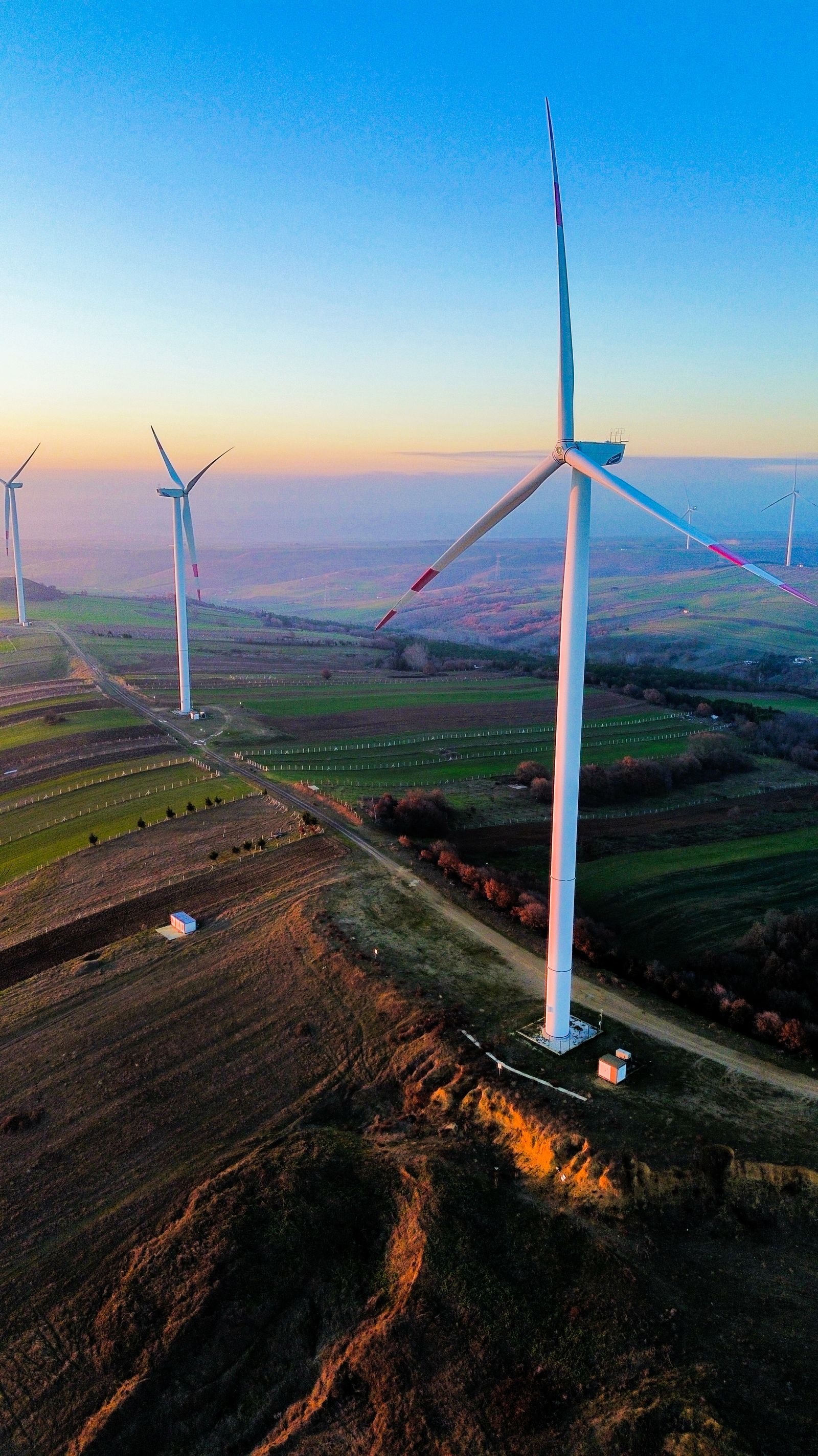 Wind turbines at sunset