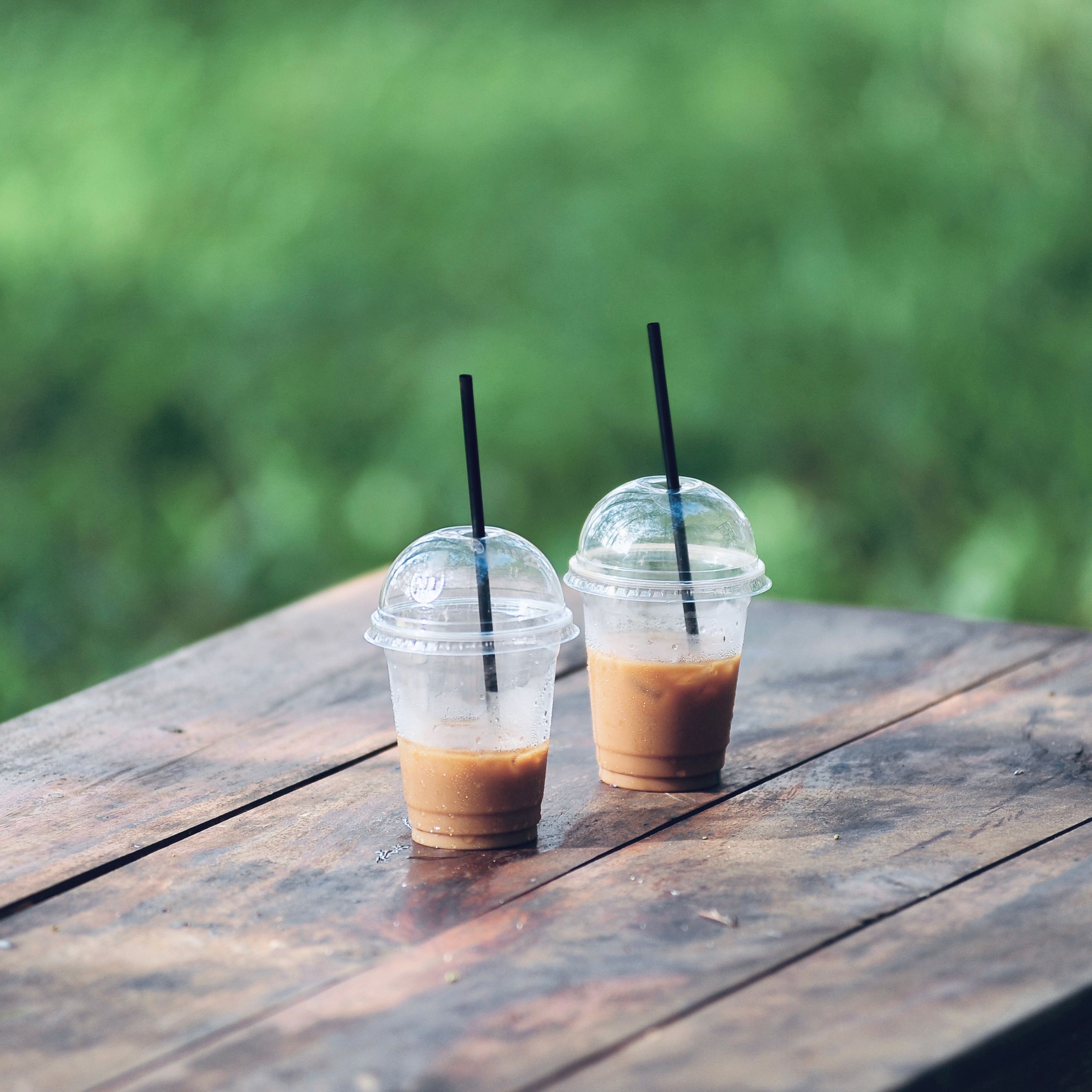 Clear compostable cold cups — photo by Mai In May on Pexels