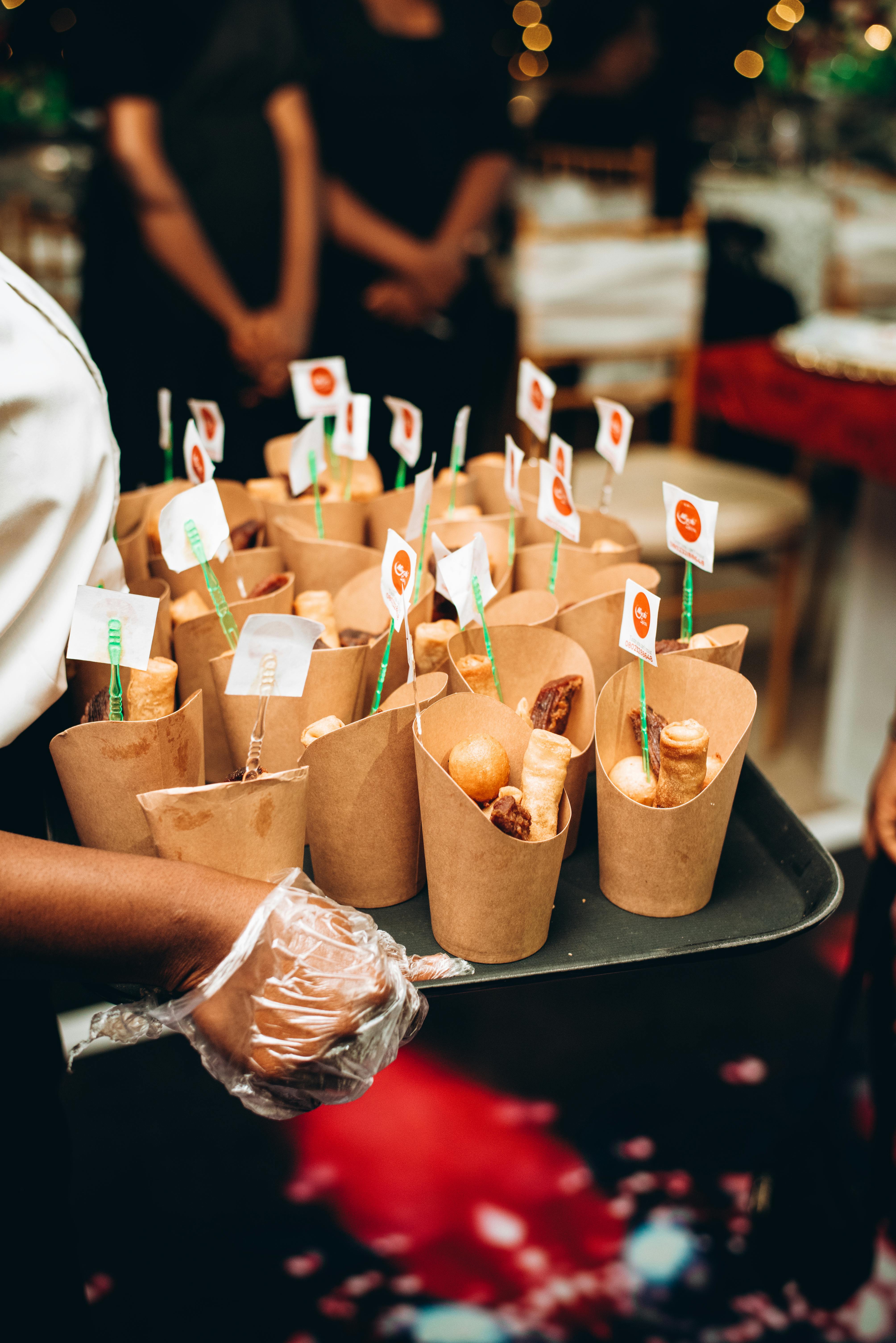 elegant catering tray with food cones at event