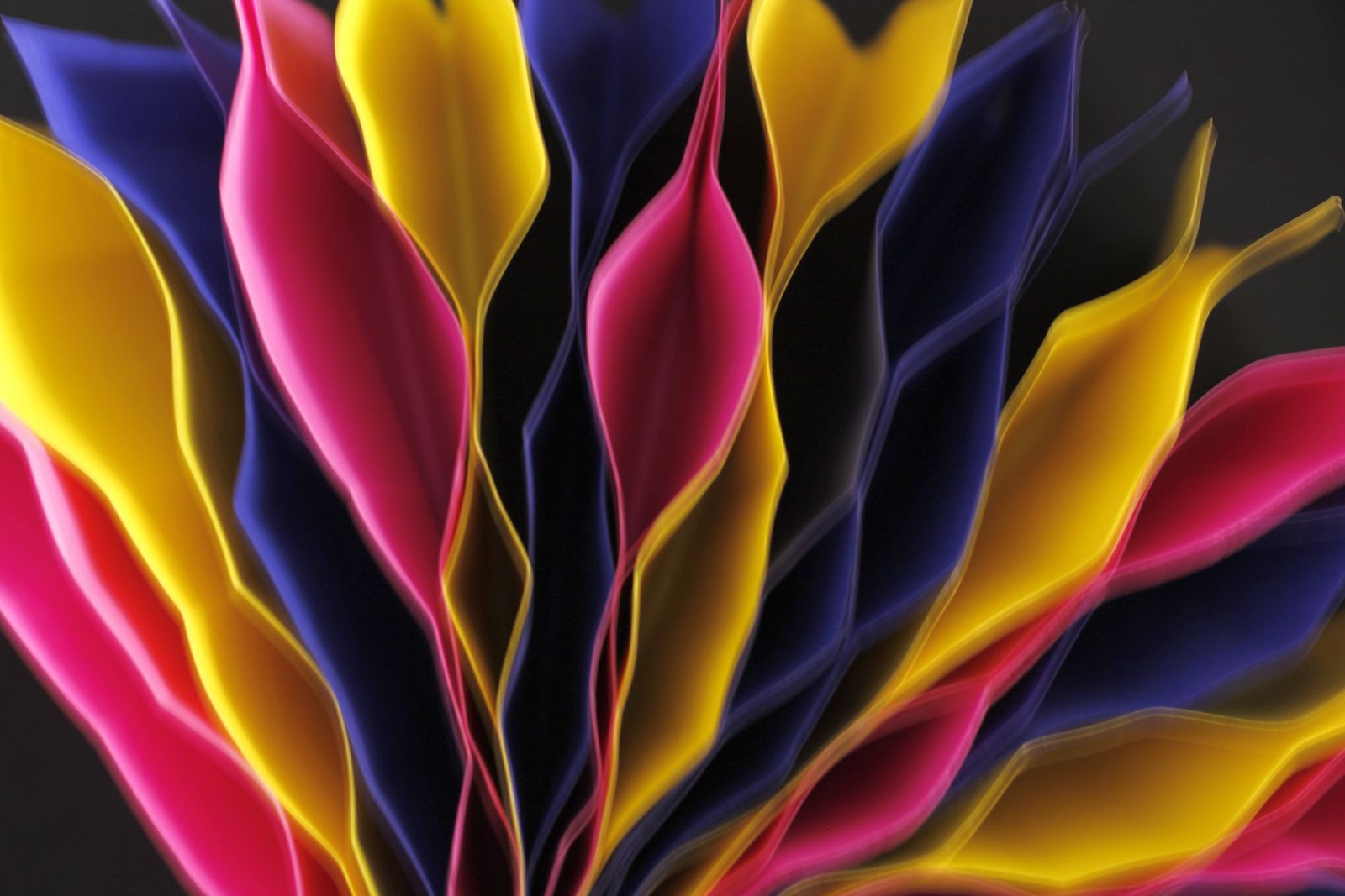 Colourful abstract paper forms representing distinct but connected compute, data, management and recovery planes.