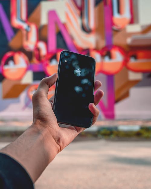 Free Person Holding Iphone 8 Stock Photo