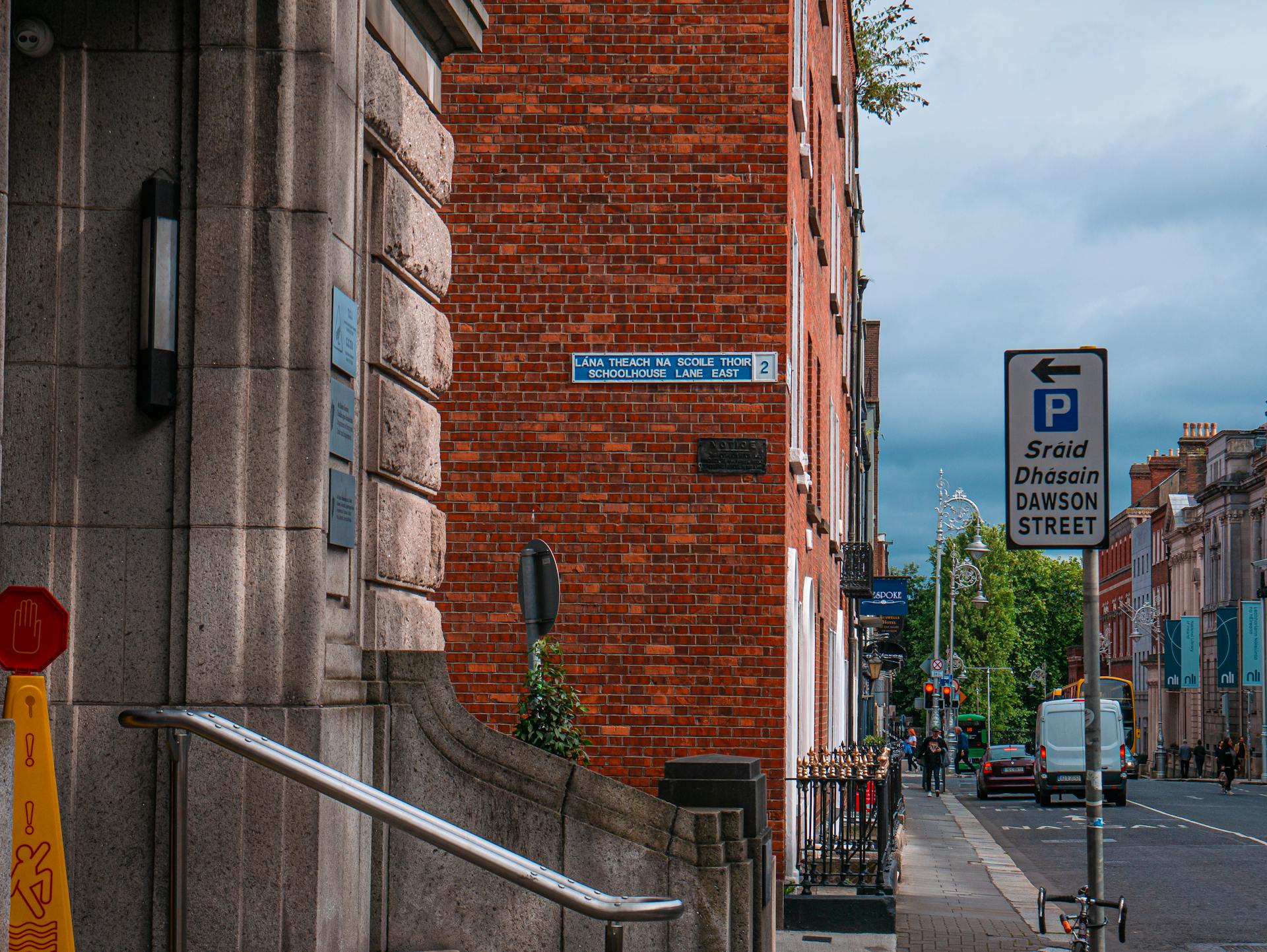 Vibrant street scene at Dawson Street, Dublin with visible signage and architectural elements.