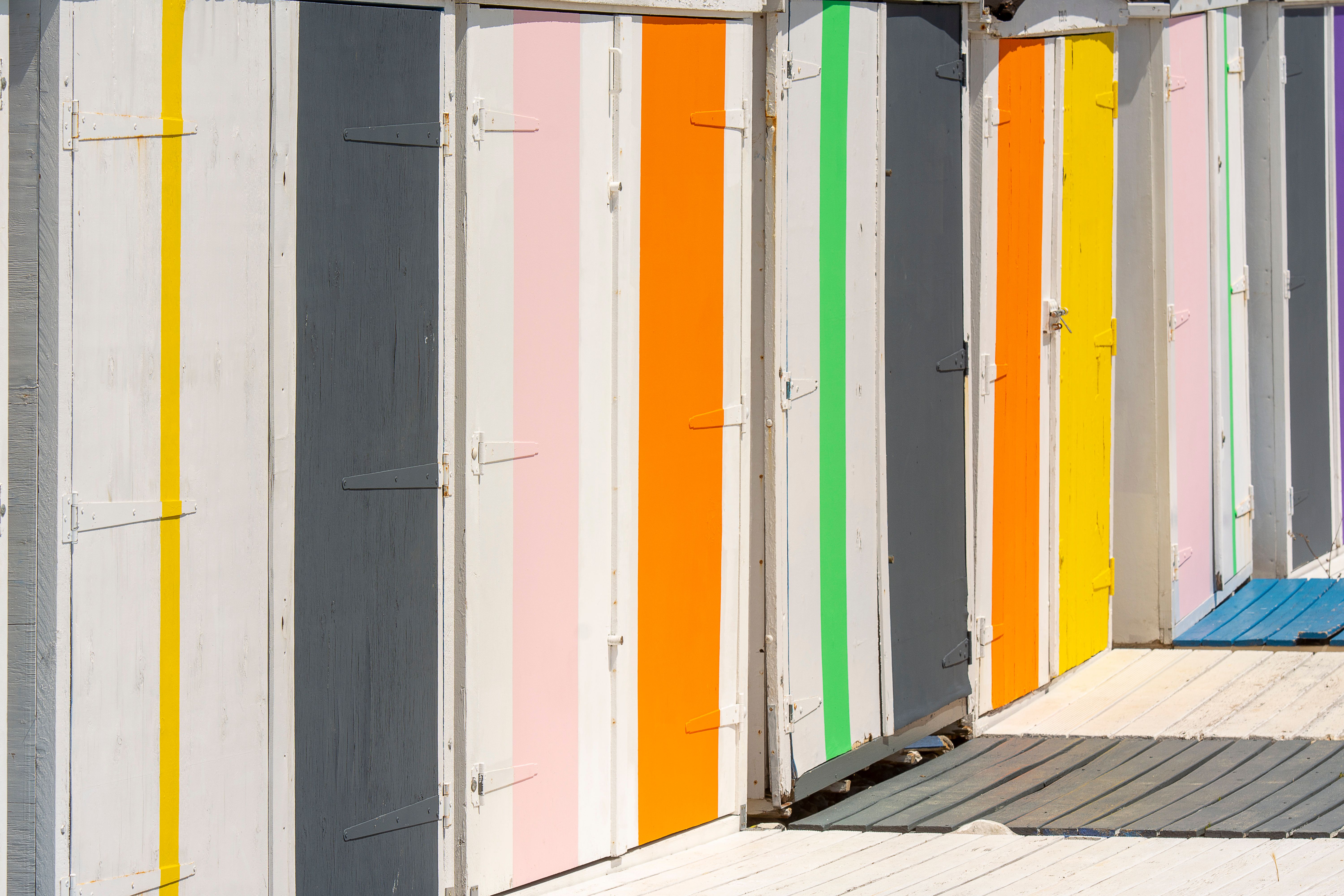 Fence and Decking Painting in St John's Wood — clean edges cut in around trim and sockets