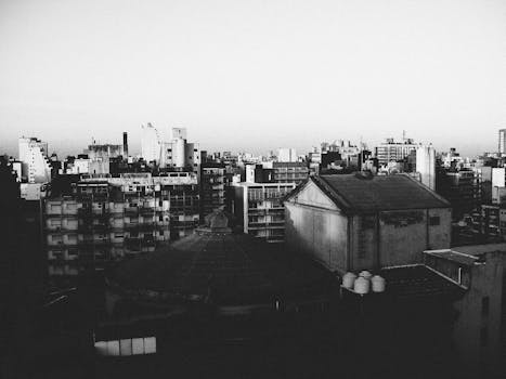 High contrast urban skyline in Rosario, Argentina viewed at dawn in black and white.