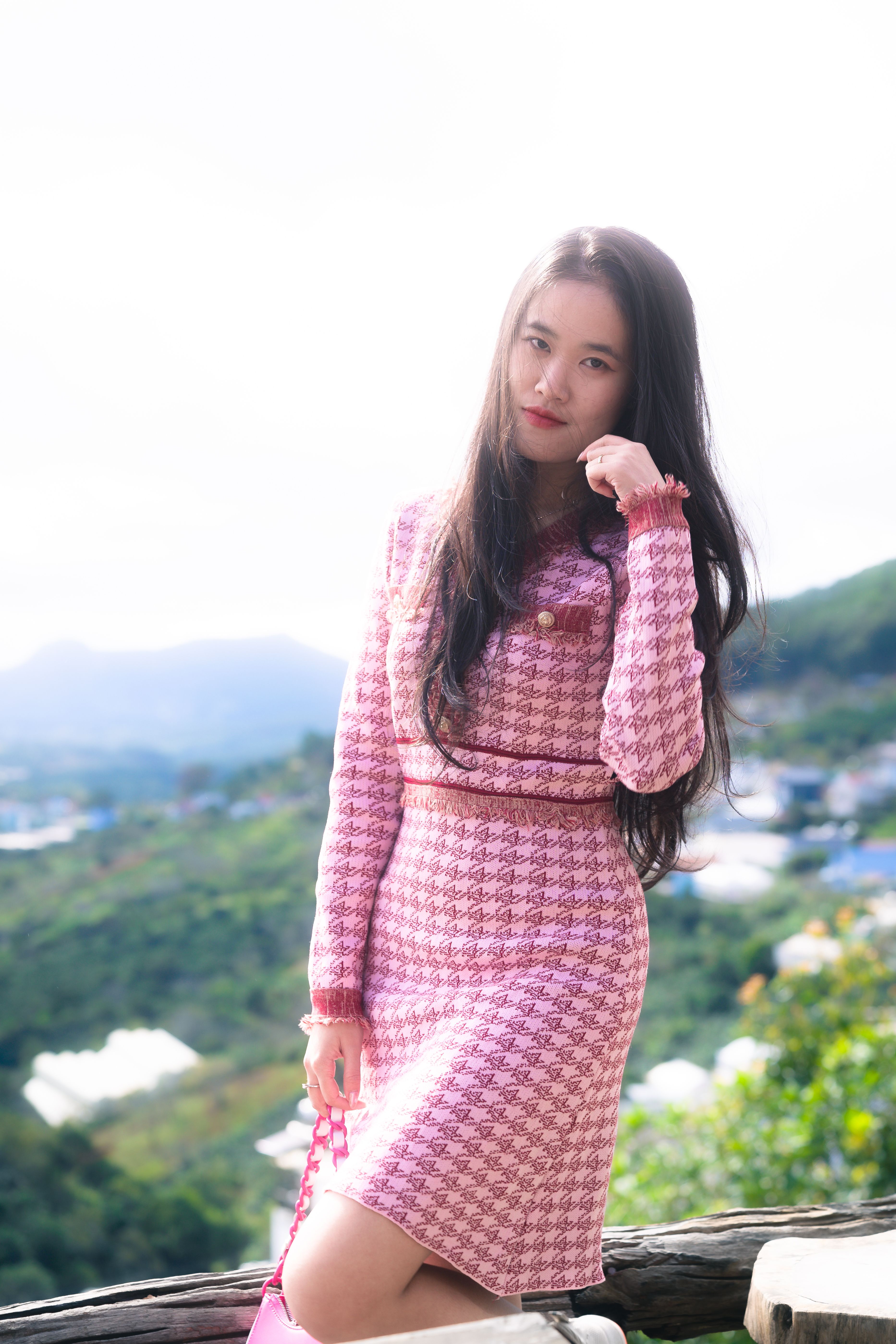 Young Woman Posing in Pink Dress Outdoors · Free Stock Photo