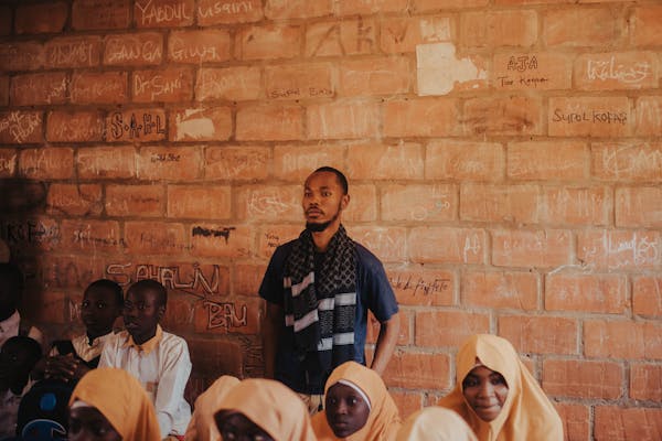 Teacher engaging with students in classroom