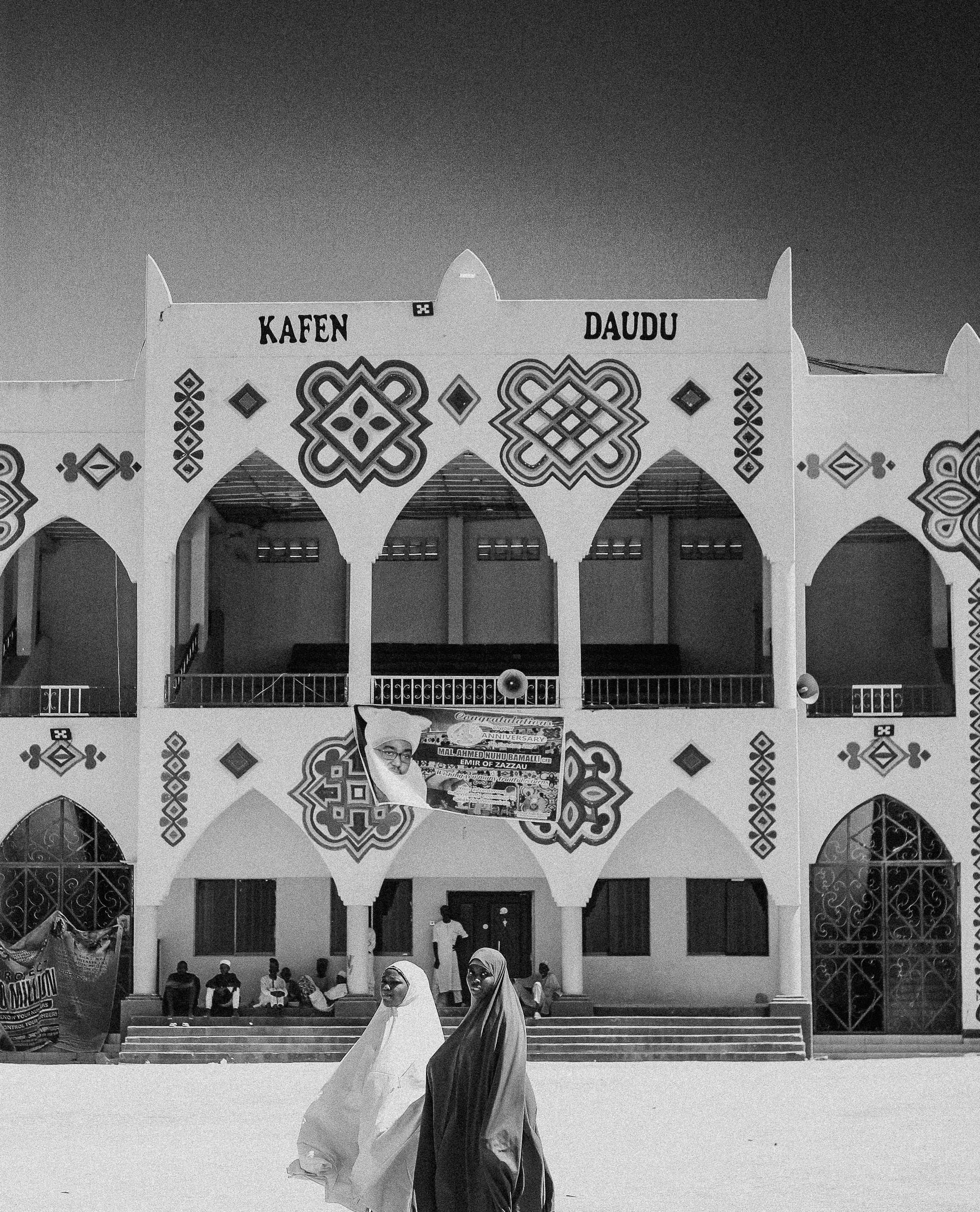 Cultural Architectural Building with People in Traditional Attire ...