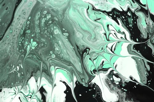 Free A vibrant abstract fluid art piece with swirling green and black patterns. Stock Photo