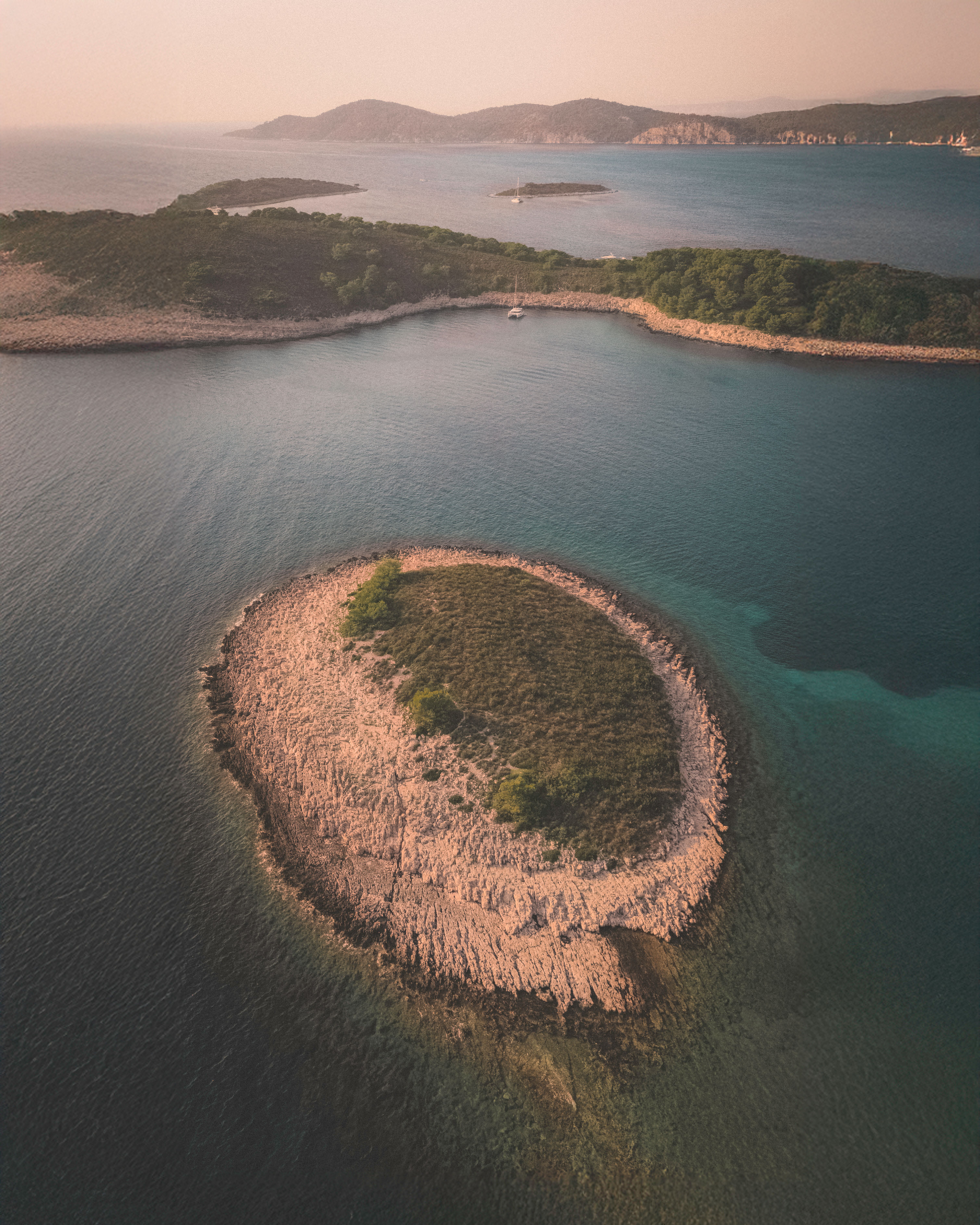 Aerial view of picturesque islands in Split-Dalmatia, Croatia at sunset.