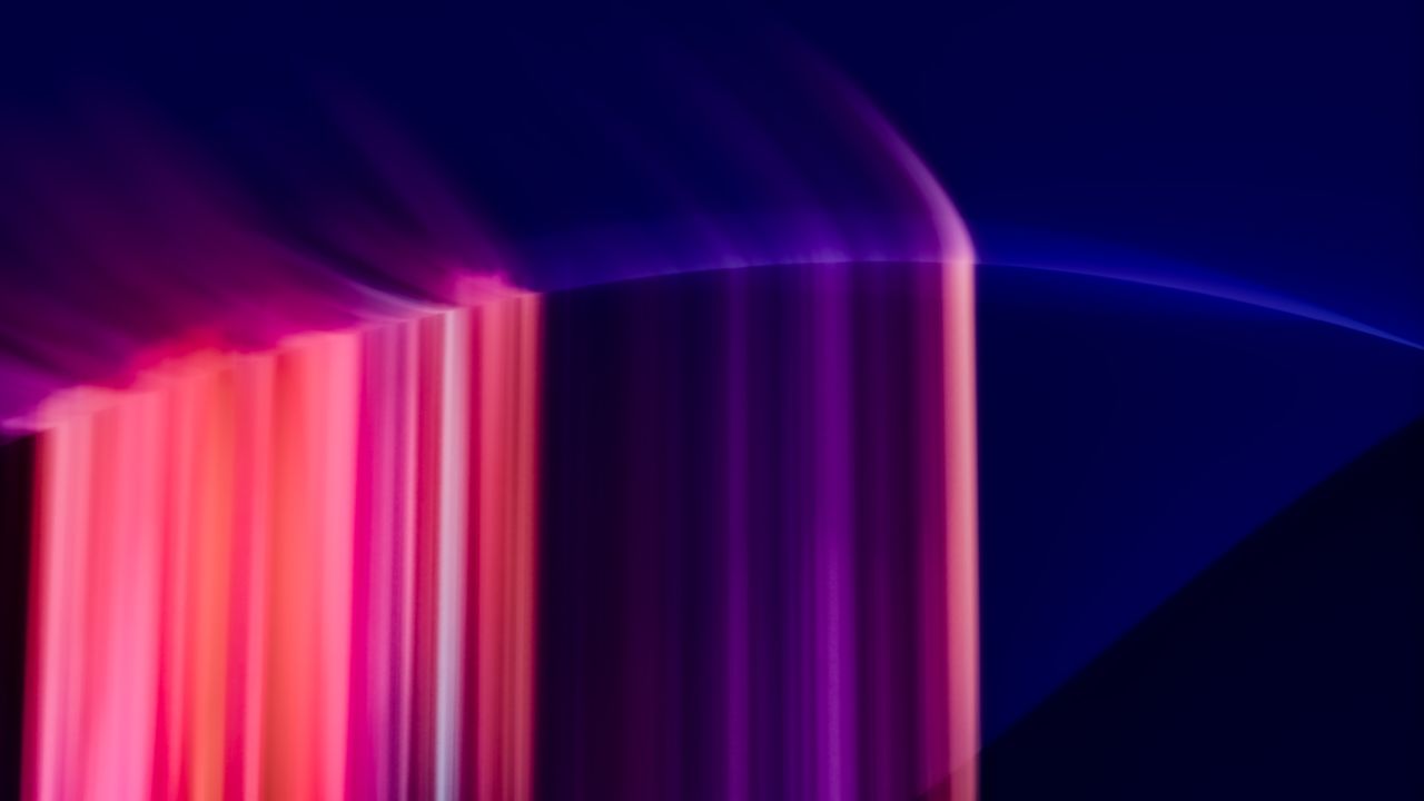 dynamic abstract image with vibrant light streaks in purple and pink t