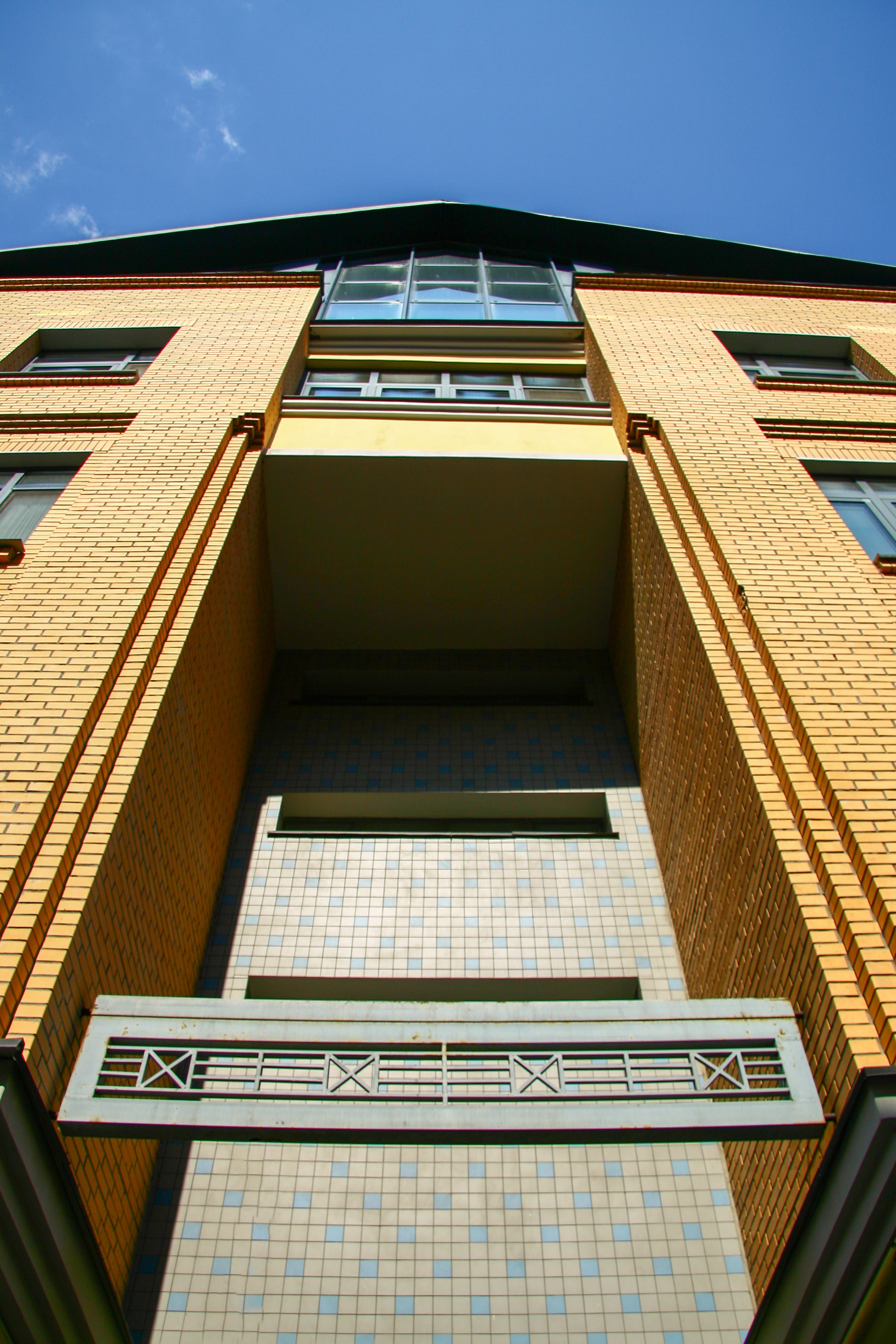 Modern Yellow Brick Building Upward View · Free Stock Photo