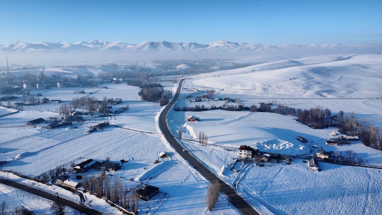 Distant Rural Area Snowy Rural Landscape with Distant Mountains · Free Stock Photo