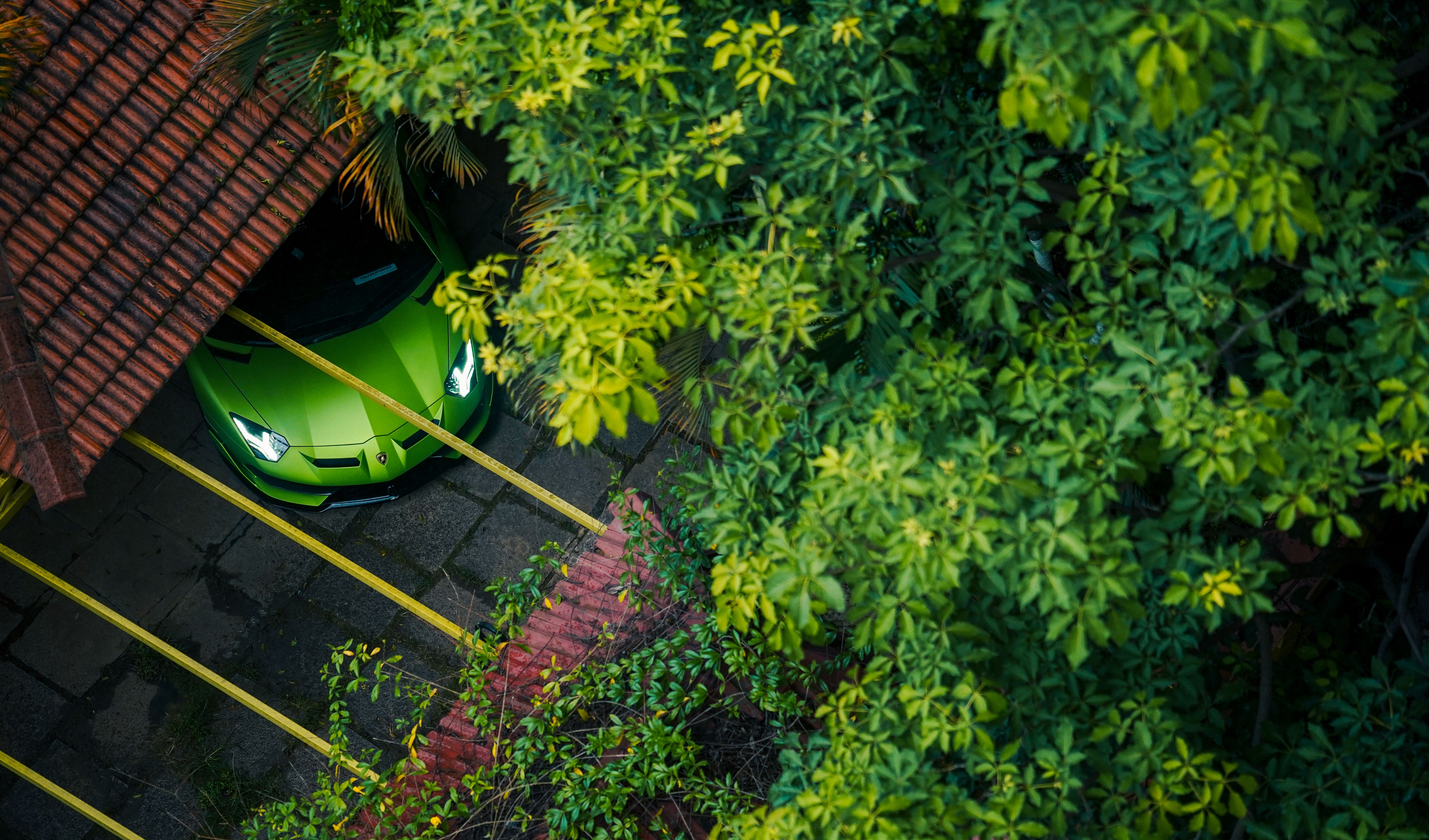 vehicle parked under protective carport