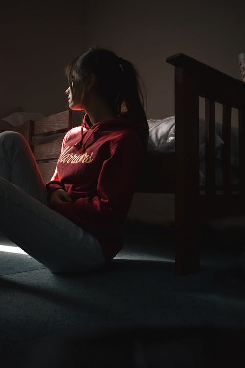 Free Photo Of Woman Sitting On Floor Stock Photo