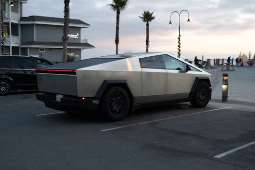 A futuristic vehicle parked at sunset by the California boardwalk, capturing a modern and innovative design.