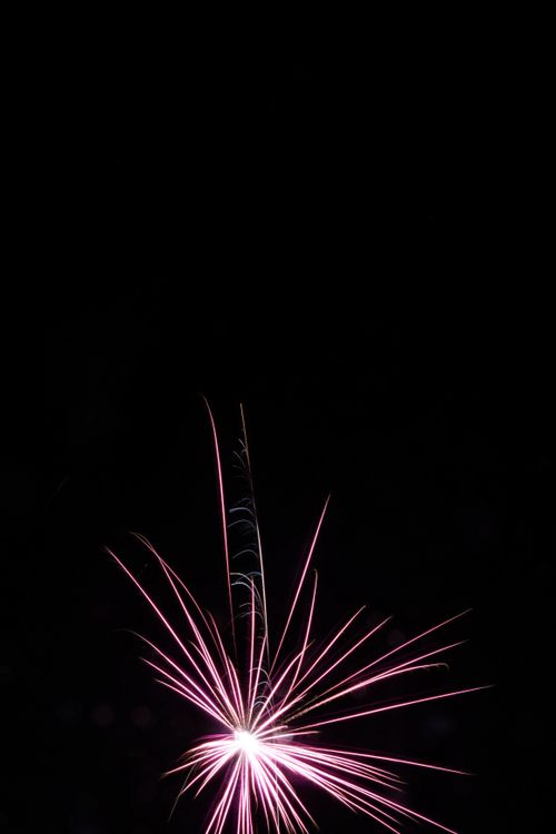Free Captivating fireworks explode with vibrant colors in the night sky over Jönköping, Sweden. Stock Photo