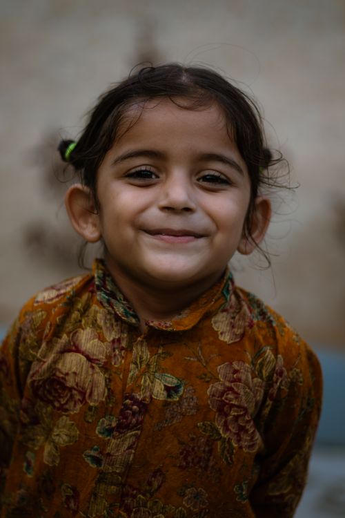 Free Charming portrait of a joyful child, capturing innocence in traditional attire, Himachal Pradesh. Stock Photo