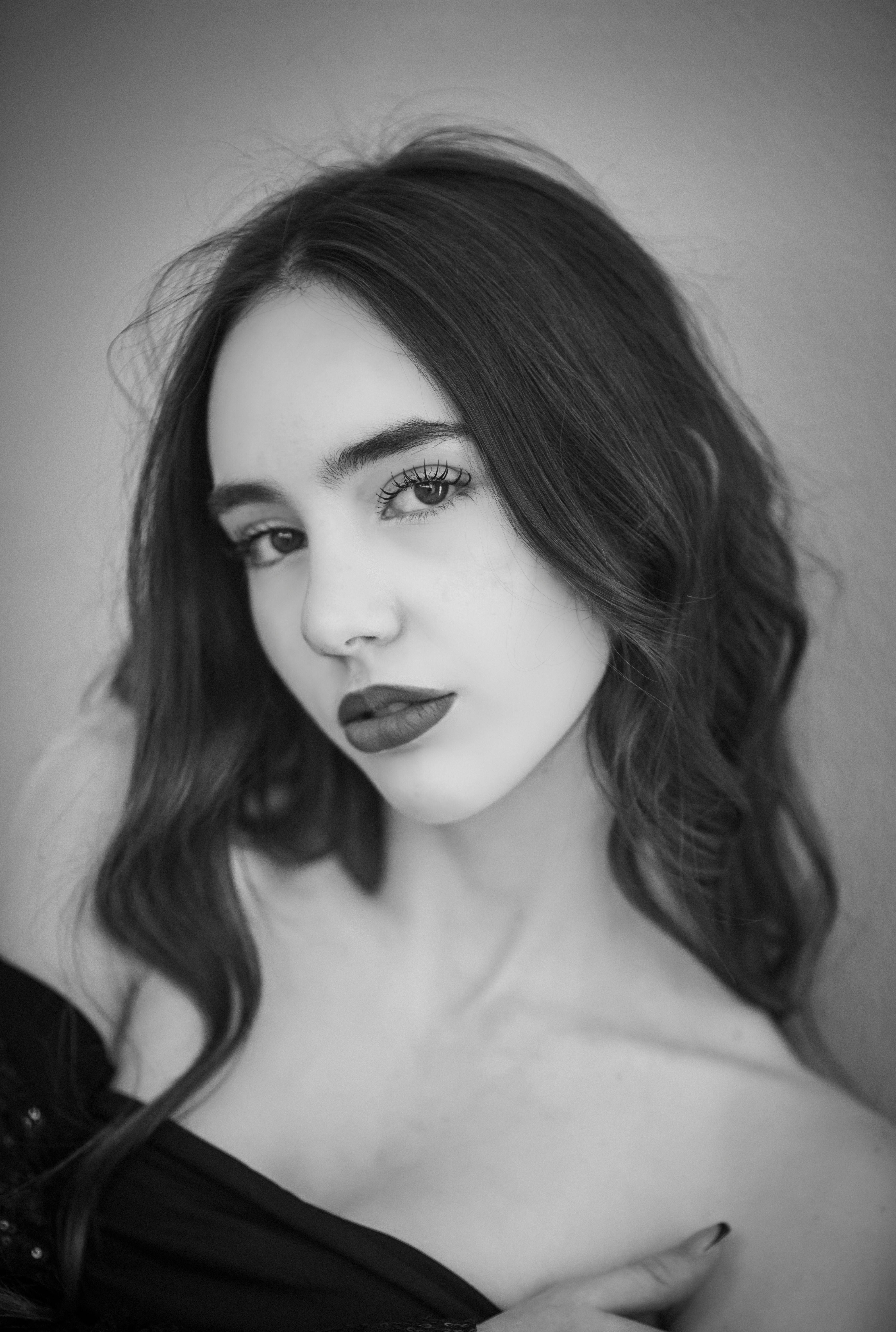 Black and White Portrait of a Woman with Long Hair · Free Stock Photo