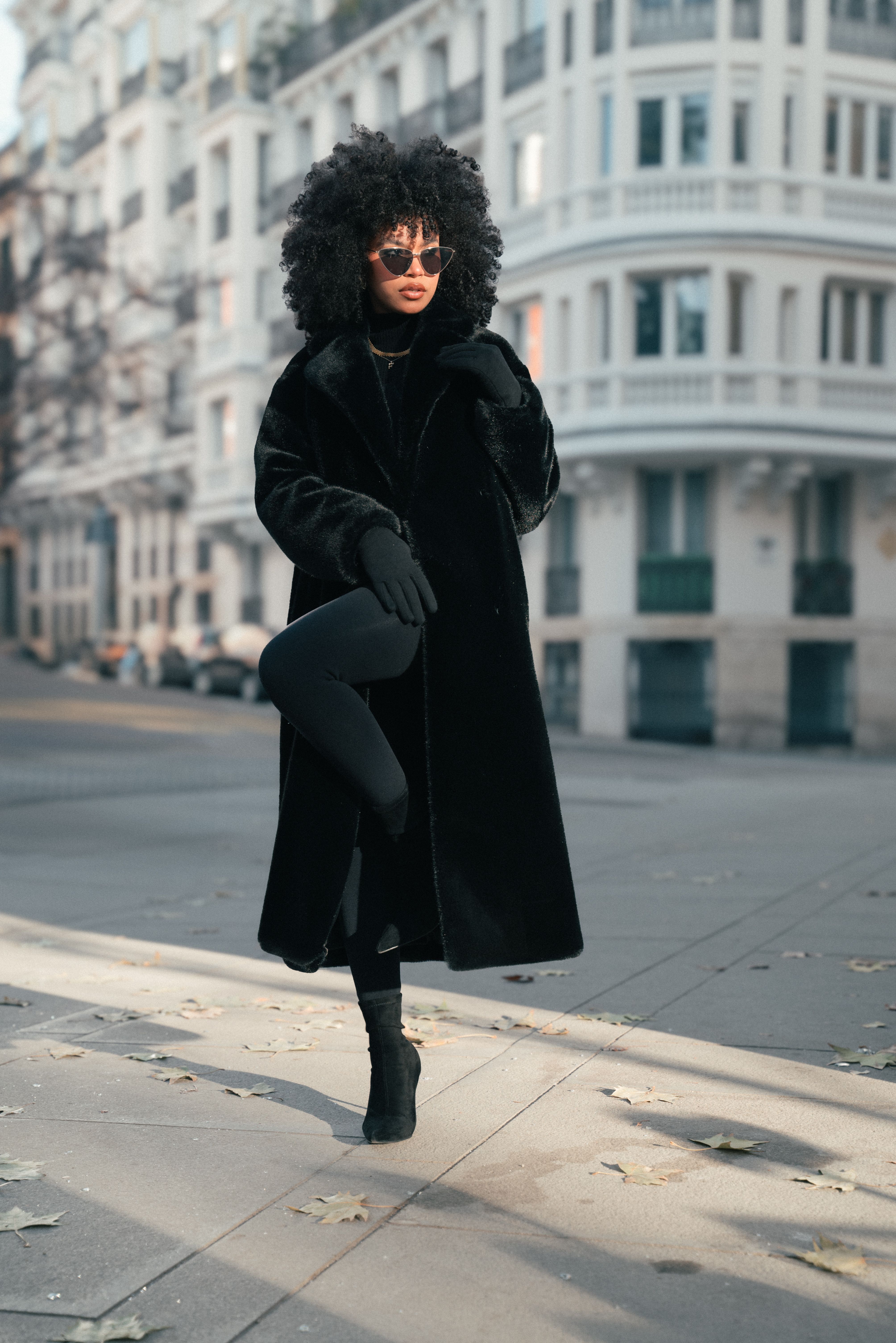 Stylish Woman in Black Coat on Urban Street · Free Stock Photo