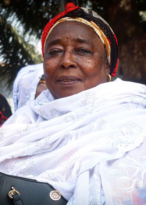 Free Elderly woman in Monrovia wearing traditional African attire, showcasing cultural heritage. Stock Photo