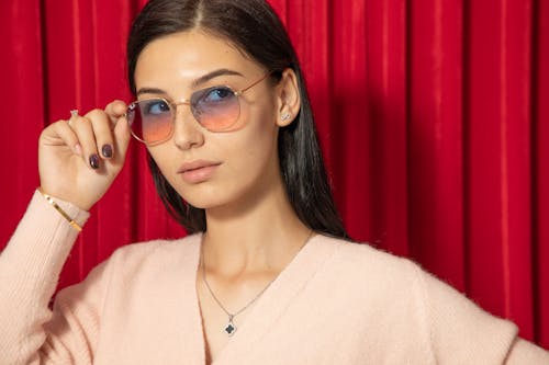 Free Woman in Sunglasses Wearing Beige Top Stock Photo