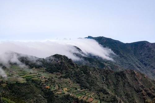 Free Breathtaking view of lush mountains and clouds in Canary Islands, Spain. Stock Photo