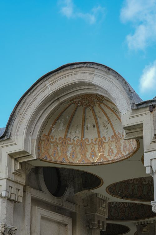 Free View of intricate Ottoman architectural details against a clear sky. Stock Photo