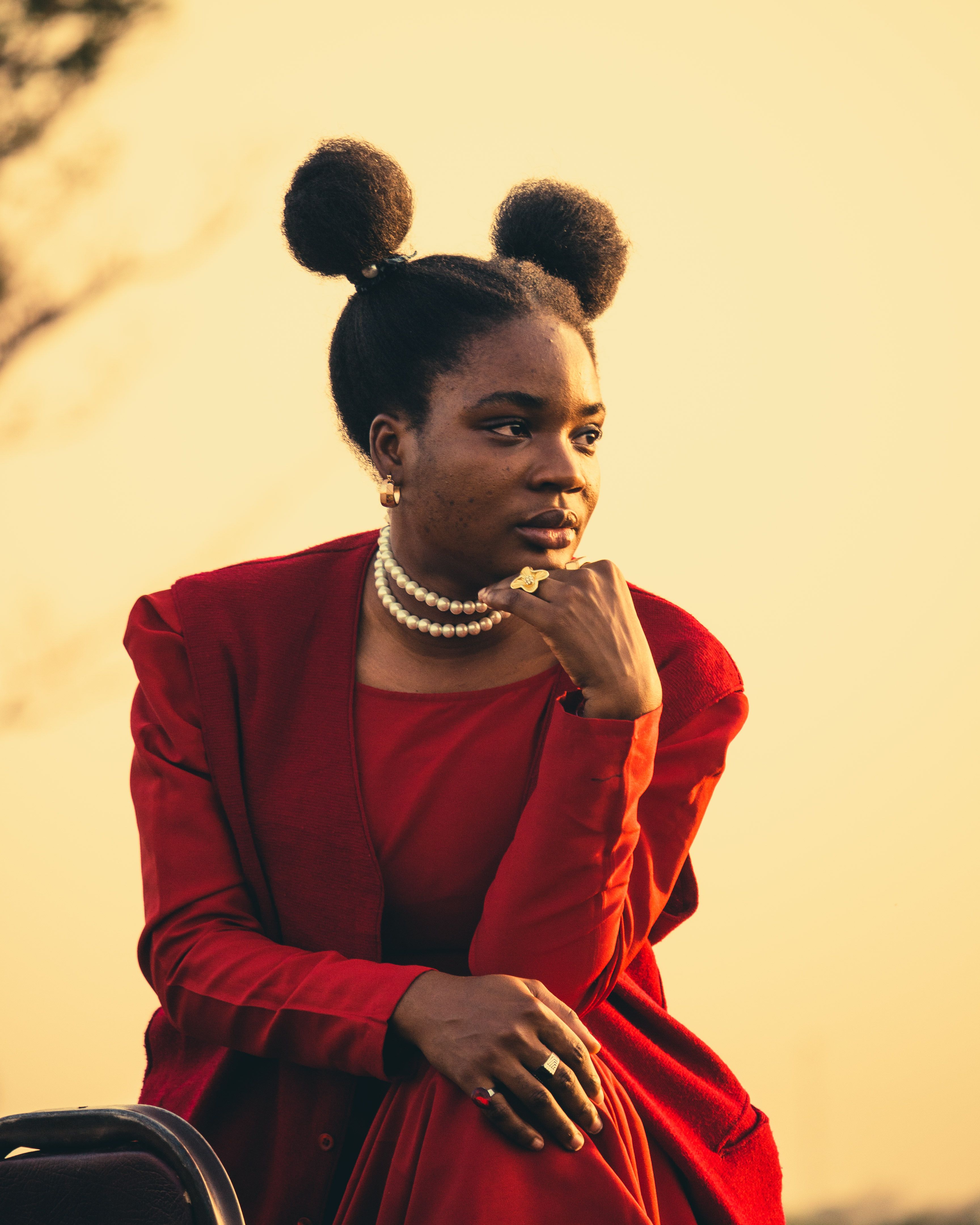 Elegant Woman Posing in Red During Sunset · Free Stock Photo