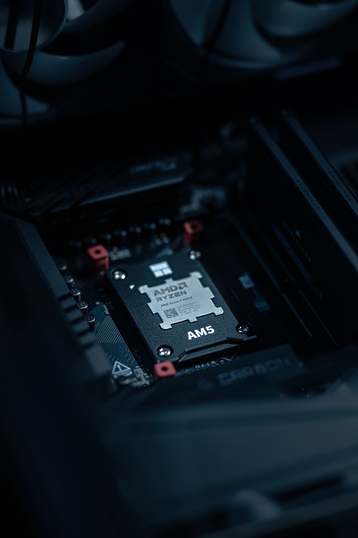 An AMD Ryzen processor seated in a motherboard socket