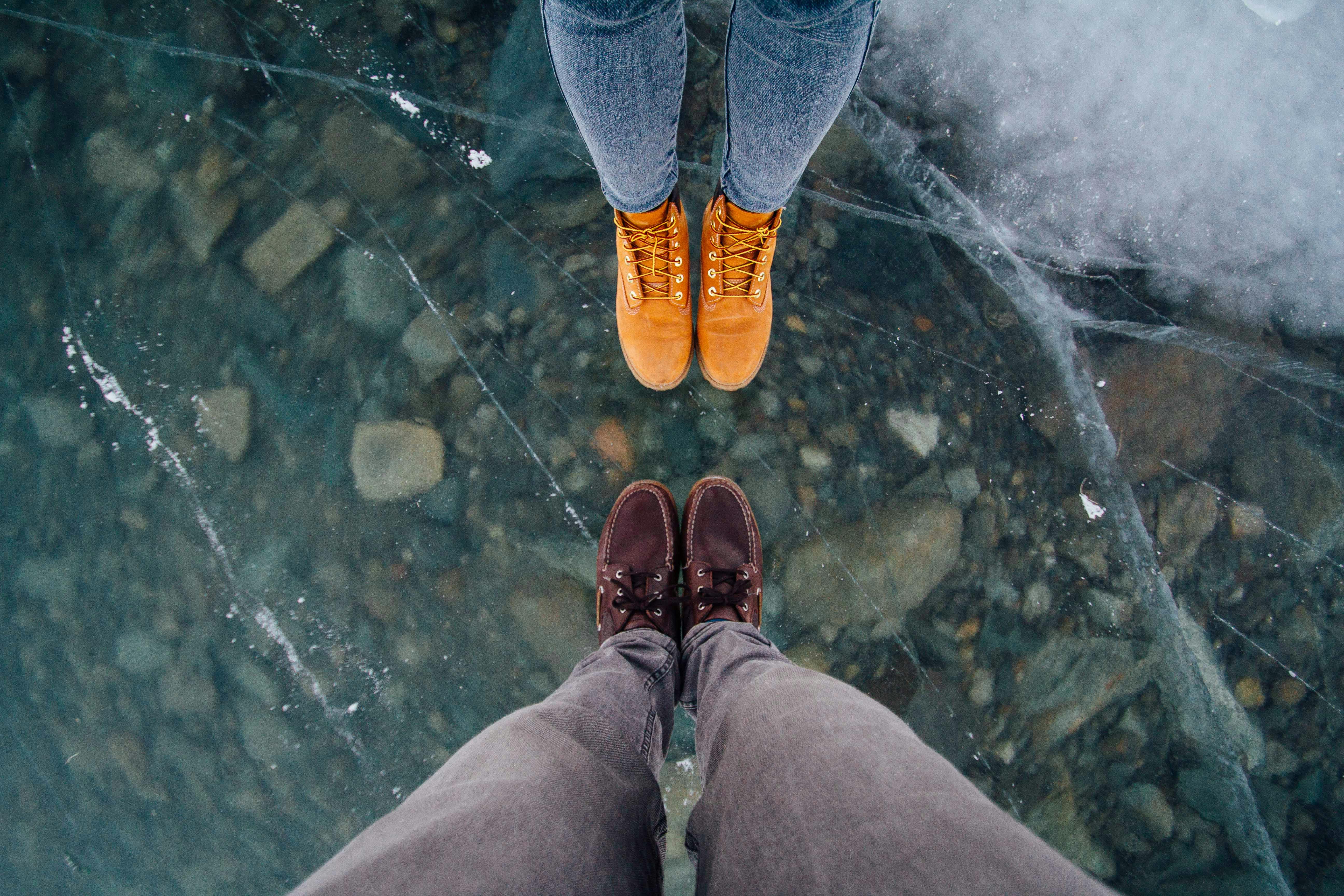 Two Person Wearing Shoes in Front of Each Other · Free Stock Photo