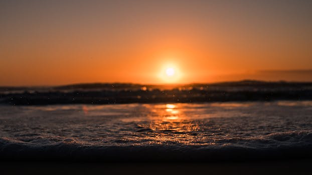 Stunning sunrise view over the ocean at Gold Coast, Queensland, Australia with glowing waves.