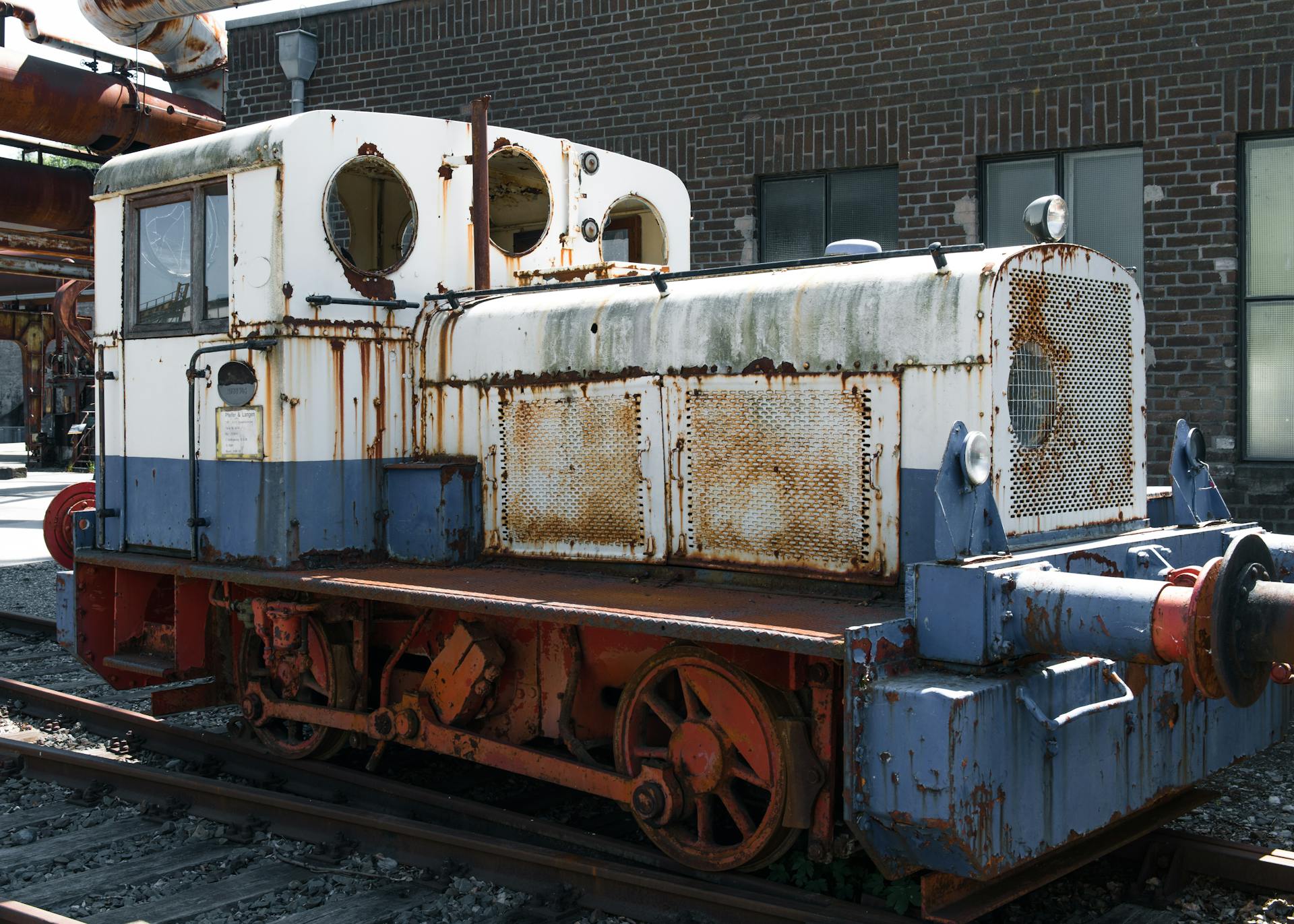 Old locomotive showcasing industrial era in German museum setting, highlighting nostalgia.